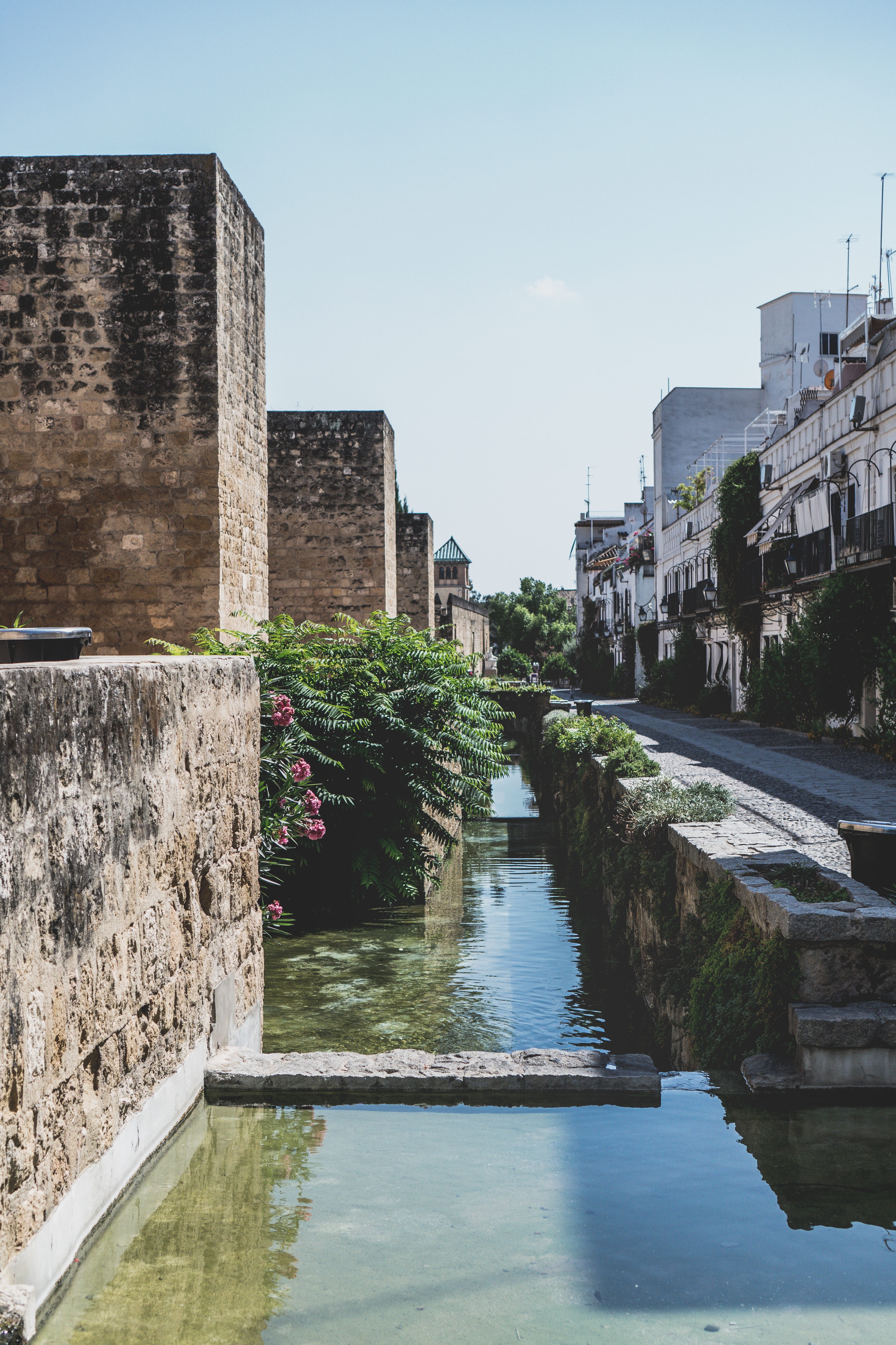 bridge, reflection, water, stone wall, nature, murallas y puertas de almodovar, building exterior, travel, street, river, city scape, 5K, photo walk, day, Phone HD Wallpaper