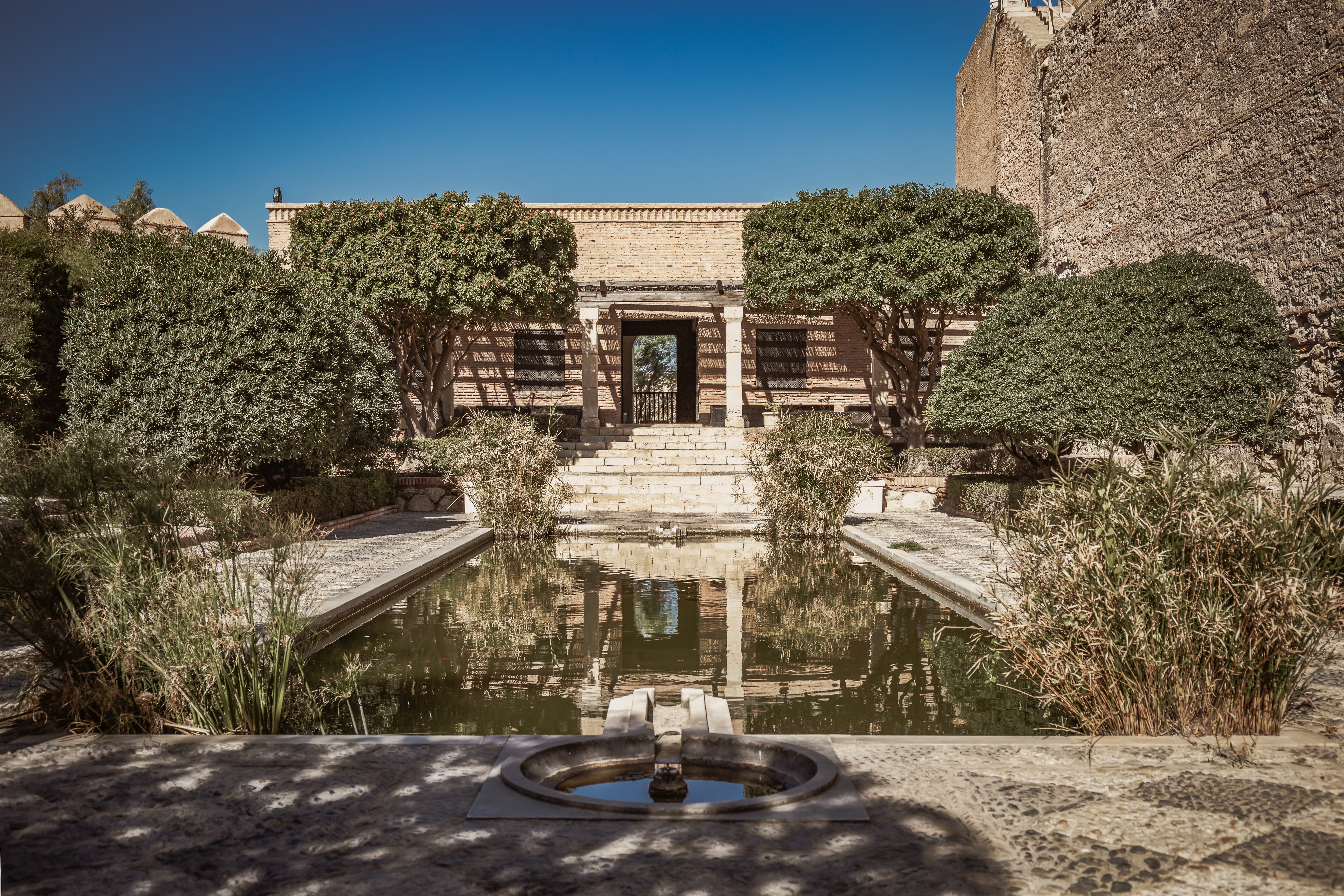growth, park, water, sky, building exterior, 5K, plant, no people, almeria, níjar, tree, sunlight, spain, nature, fountain, castle, day, historic, built structure, HD Wallpaper