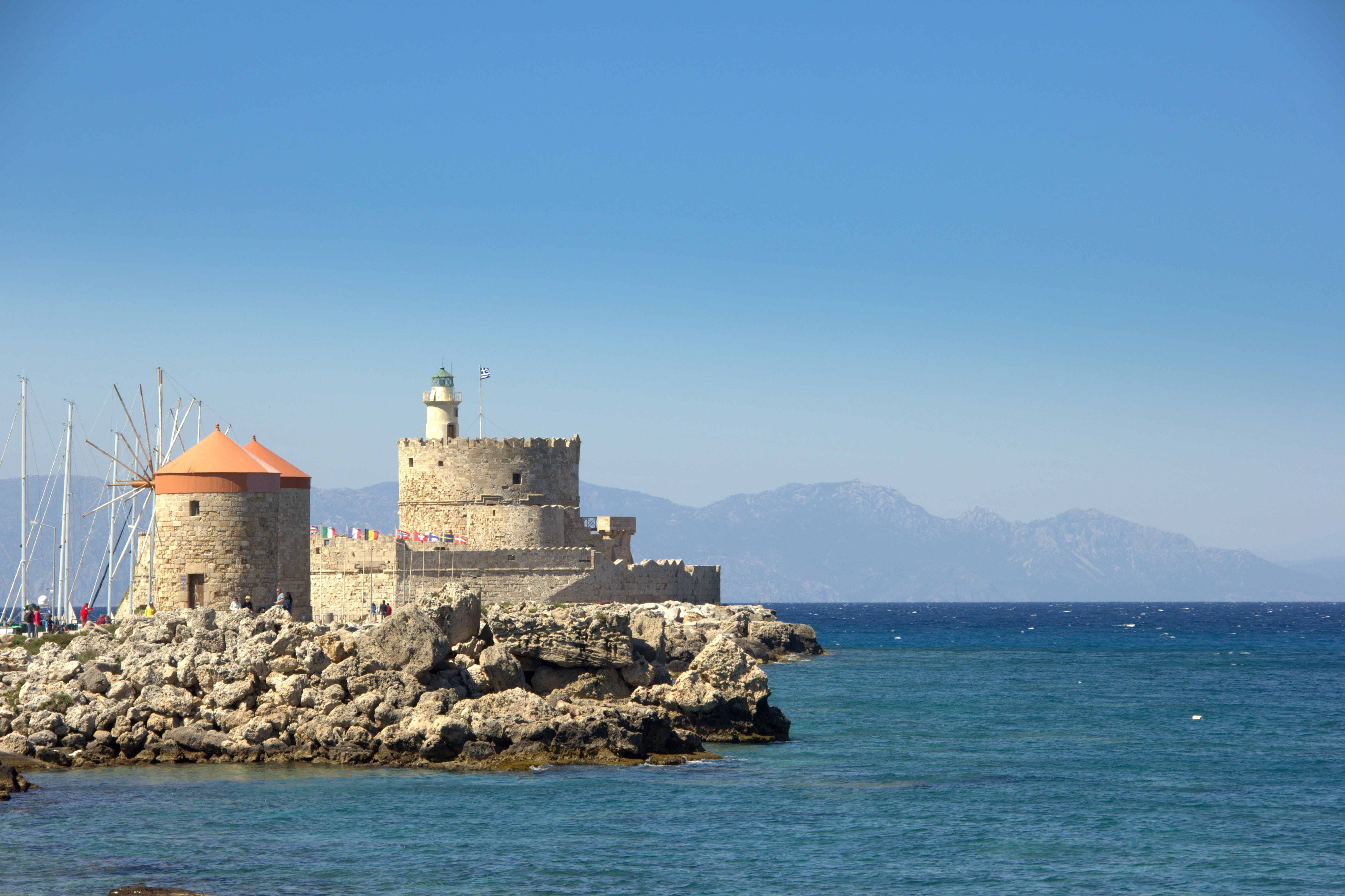 island, guidance, copy space, rhodes, sea, building exterior, sky, 5K, landscape, land, history, direction, greek, greece, clear sky, built structure, HD Wallpaper