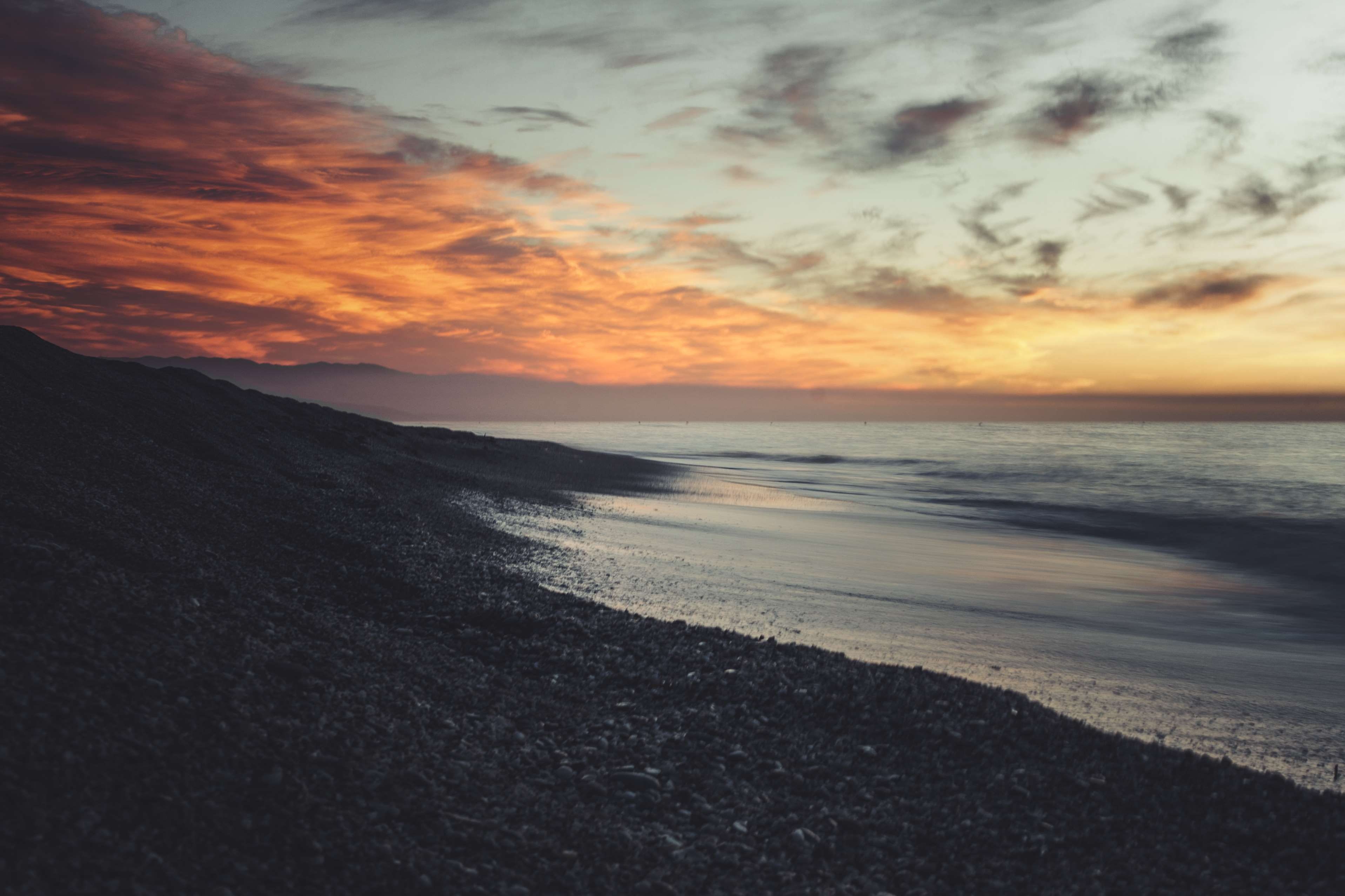 sunset, sunrise, land, wave, idyllic, rock, orange color, cloud - sky, sea, beauty in nature, andalusia, beach, 2K, horizon, motion, water, sky, tranquility, HD Wallpaper