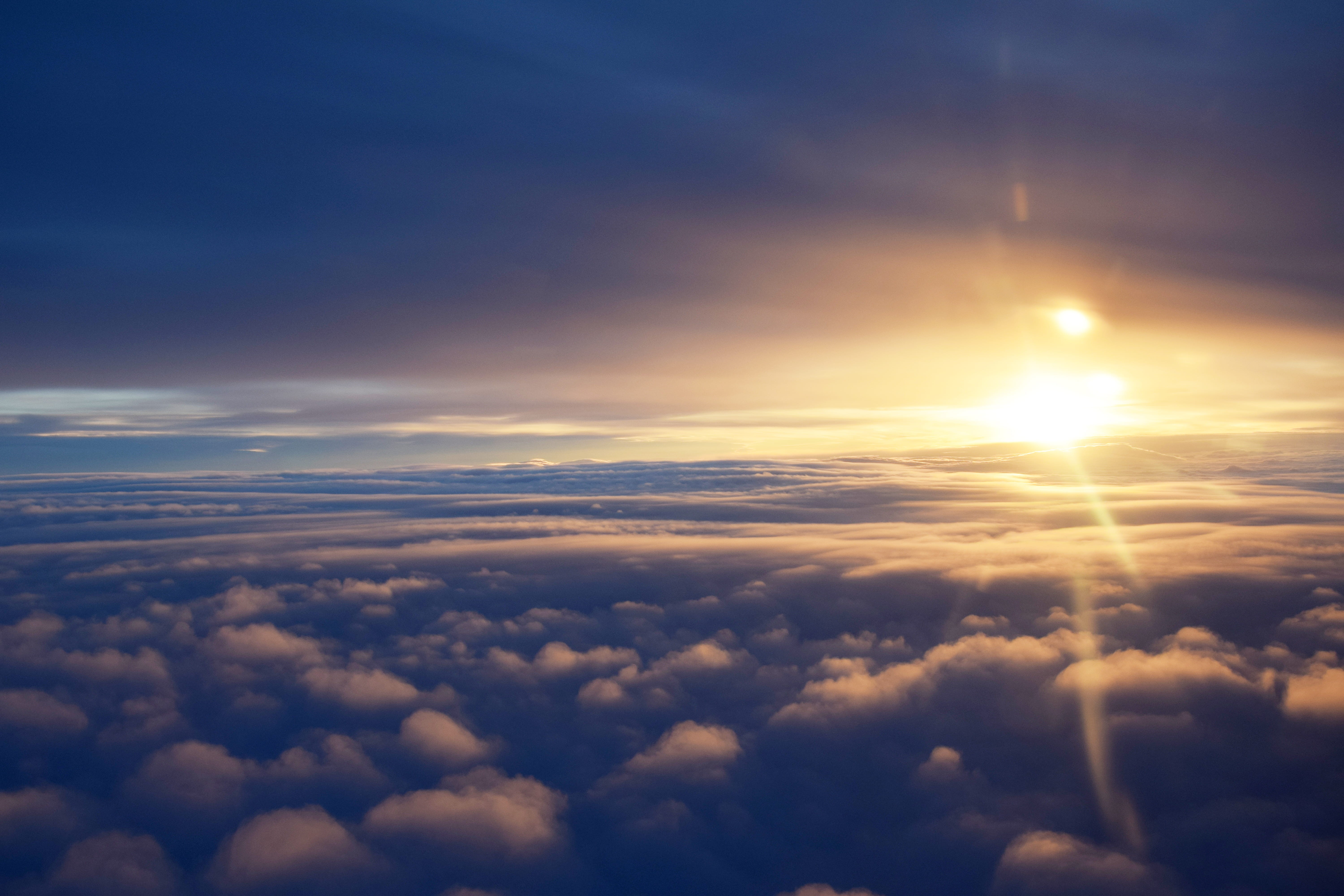 brightly lit, cloudy, lens flare, cotton, aerial view, tranquility, idyllic, sunlight, backgrounds, bright, cloud - sky, landscape, sunrise, outdoors, cloudscape, HD Wallpaper