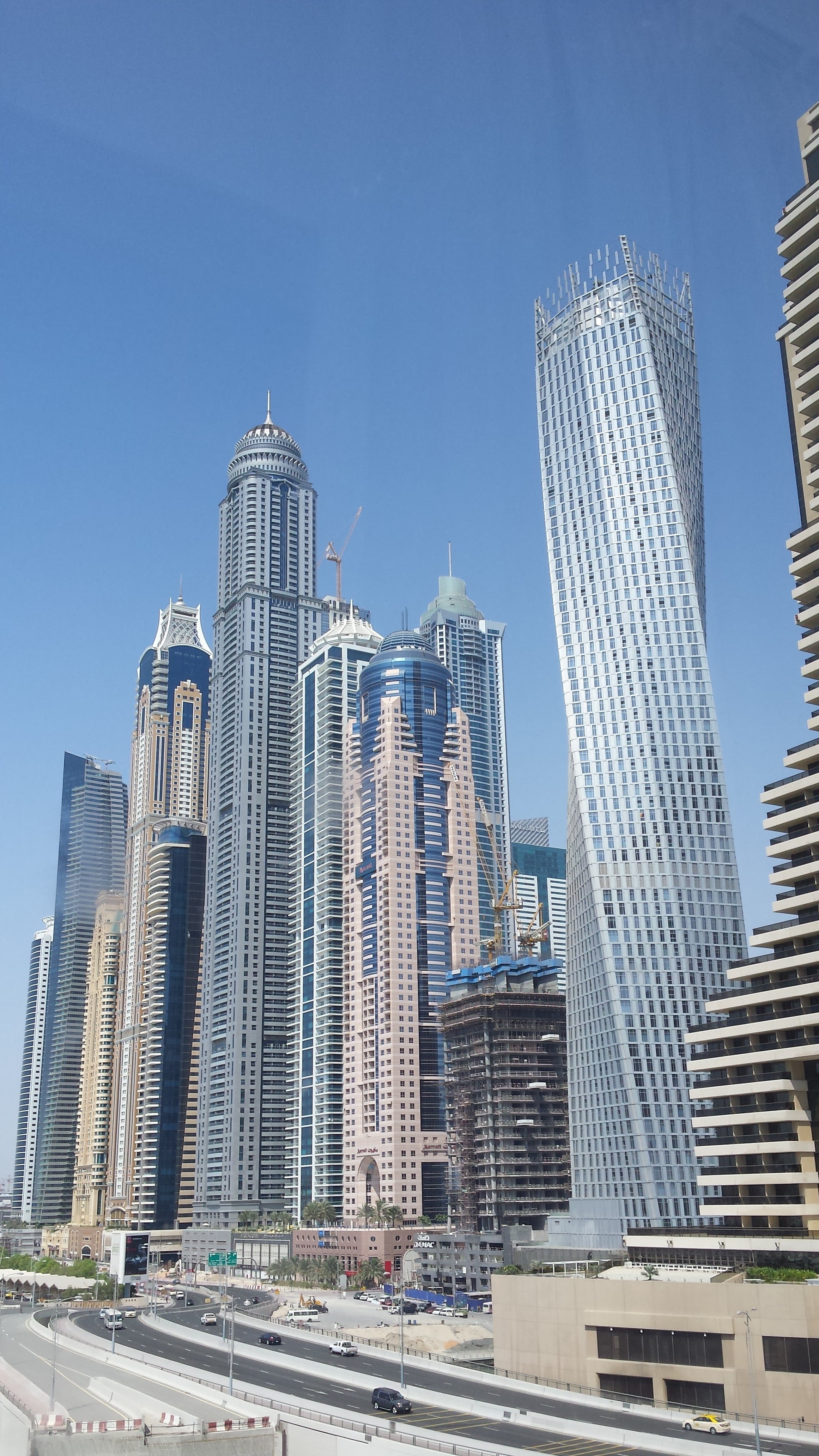 dubai, urban skyline, financial district, buildings, built structure, blue, outdoors, architecture, tall - high, modern, street, nature, cityscape, no people, Phone HD Wallpaper