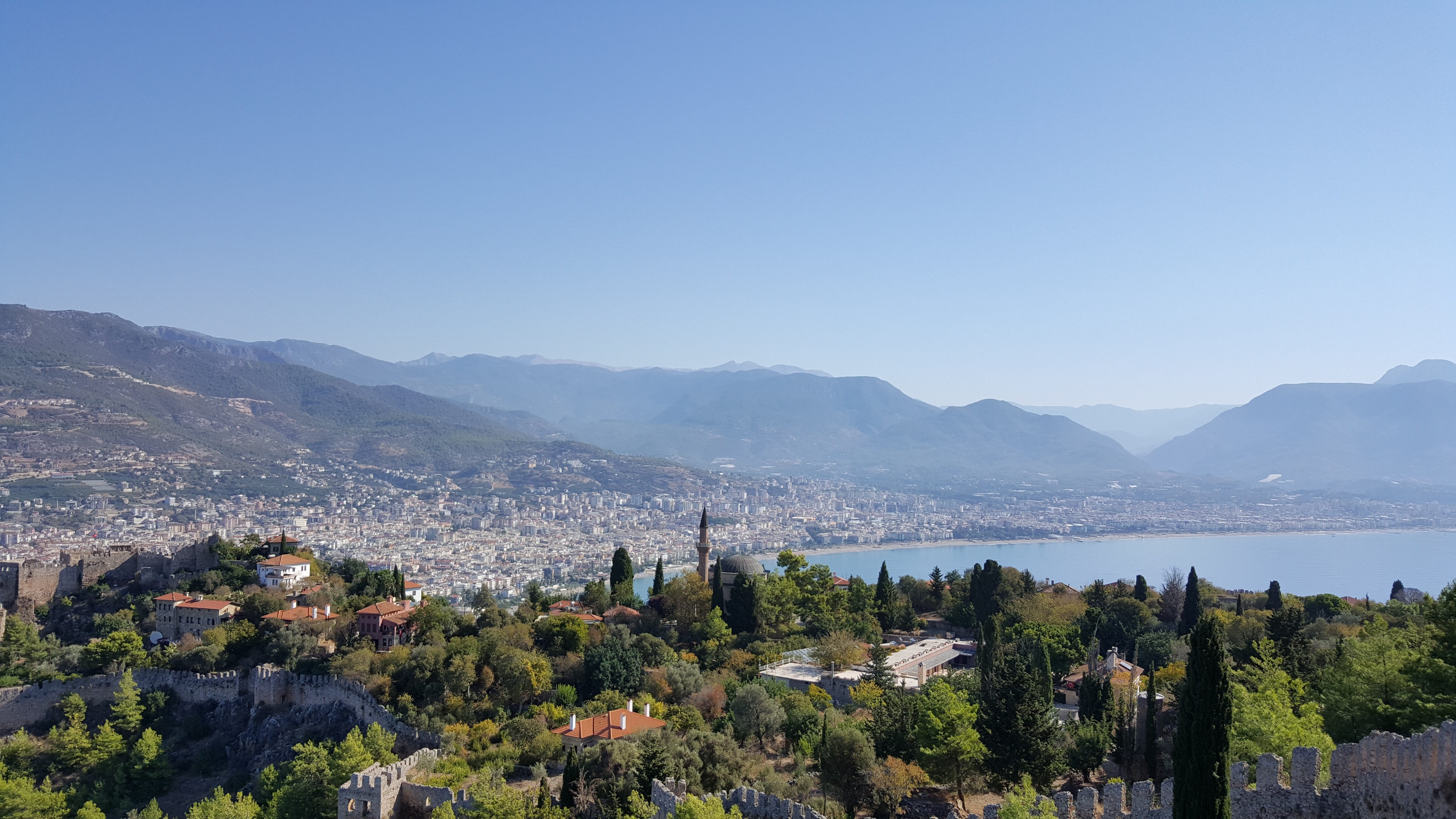 environment, building exterior, mountain range, 5K, outdoors, building, summer, landscape, coast, travel, blue, plant, alanya, sky, city, fortress, no people, HD Wallpaper