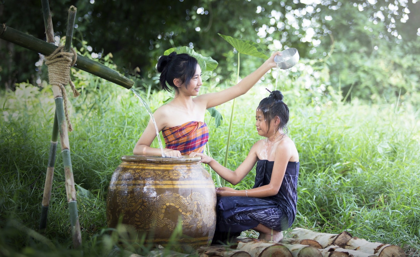 720P, Thailand, tree, bath, nature, casual clothing, emotion, bonding, men, people, plant, sitting, full length, container, portrait, holding, two people, HD Wallpaper