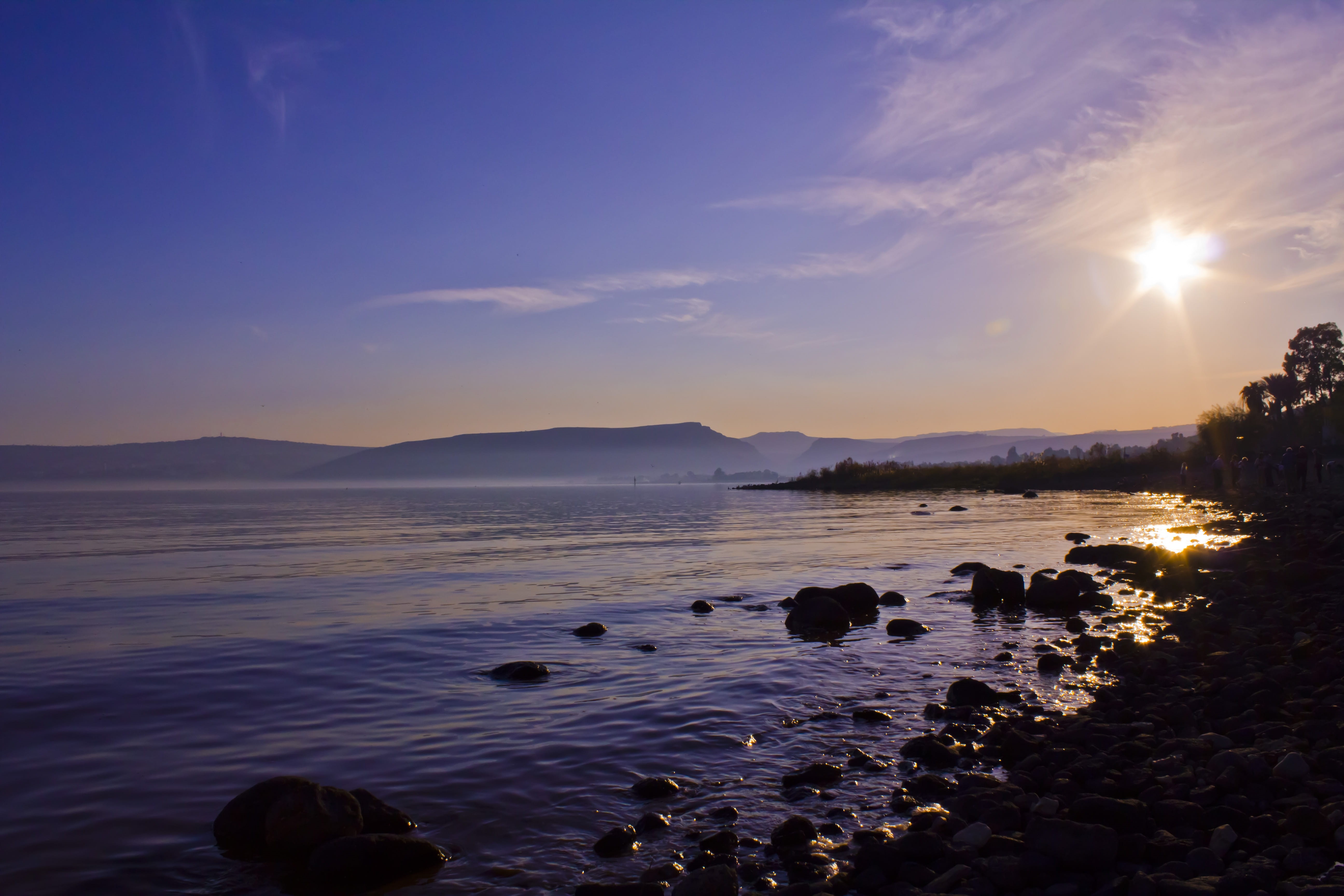 beauty in nature, silhouette, solid, rock - object, beach, lake, lens flare, cloud - sky, sunlight, sun, river, israel, rock, sky, land, water, non-urban scene, HD Wallpaper