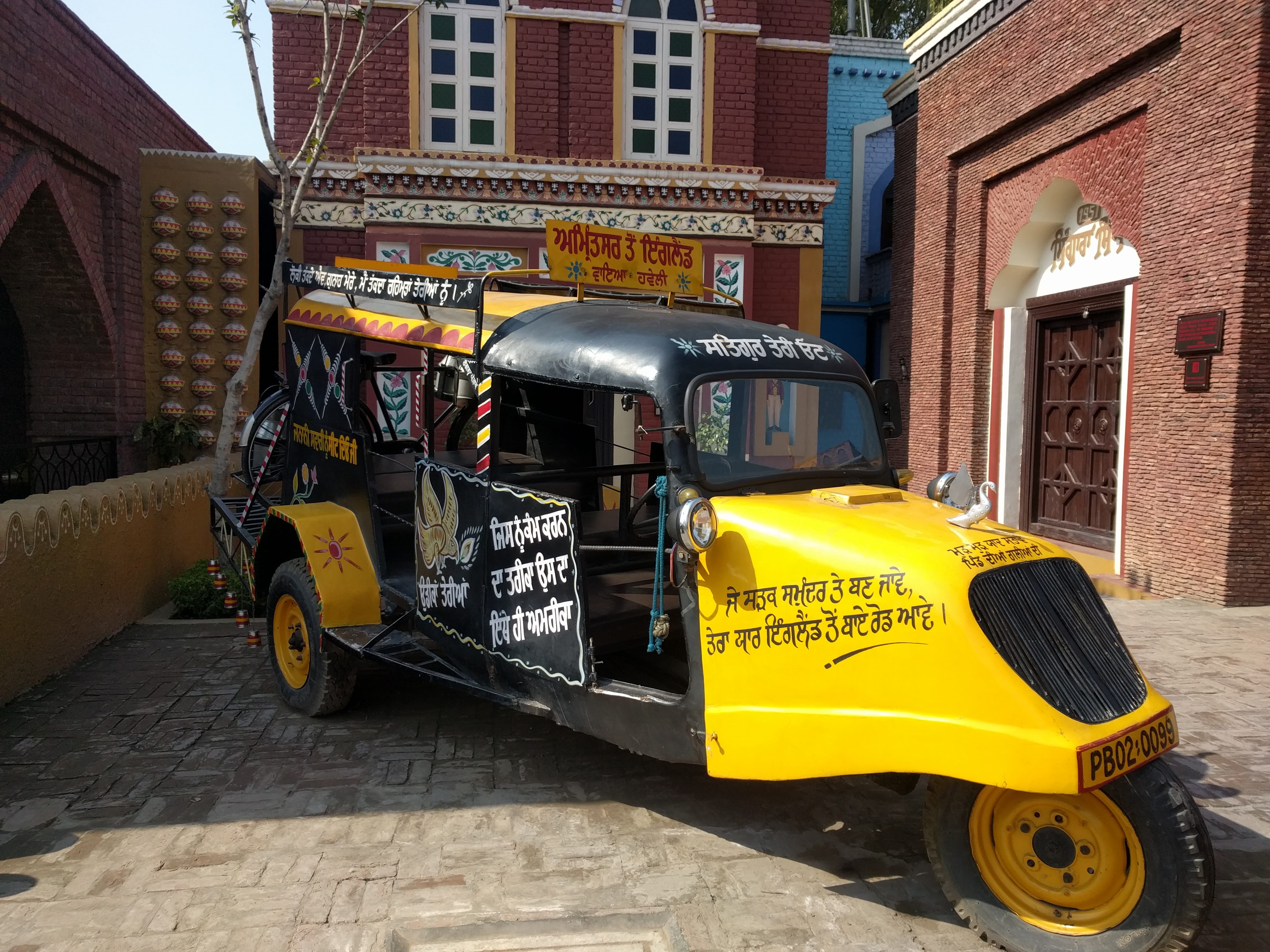communication, building, yellow, building exterior, parking, Auto, city, Autos, Love, public transportation, text, Punjab Culture, outdoors, mode of transportation, HD Wallpaper