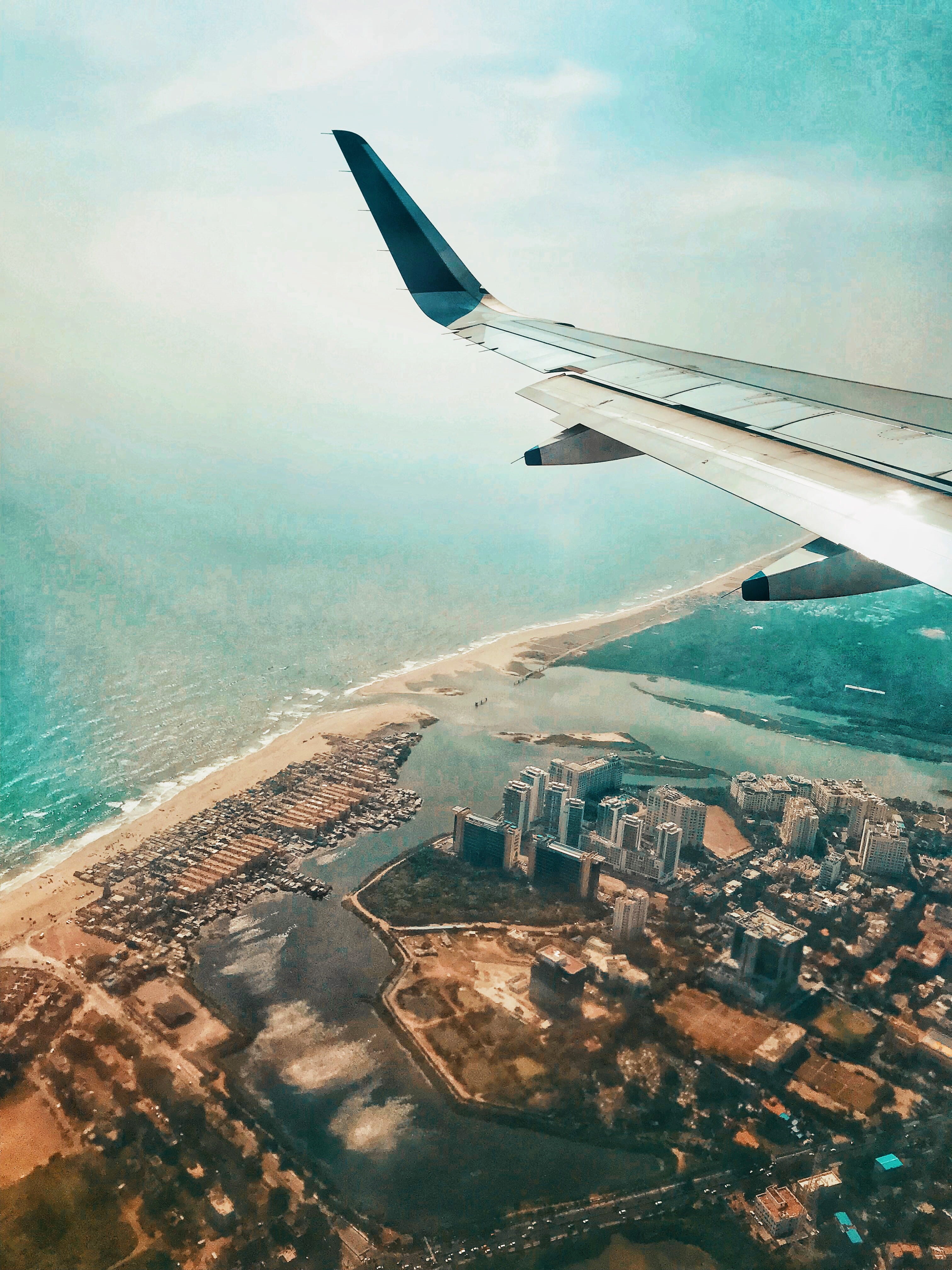 sky, mid-air, building exterior, architecture, landscape, 4K, flight, sea, water, india, chennai, beach, aircraft, day, no people, cloud - sky, aerospace industry, Phone HD Wallpaper