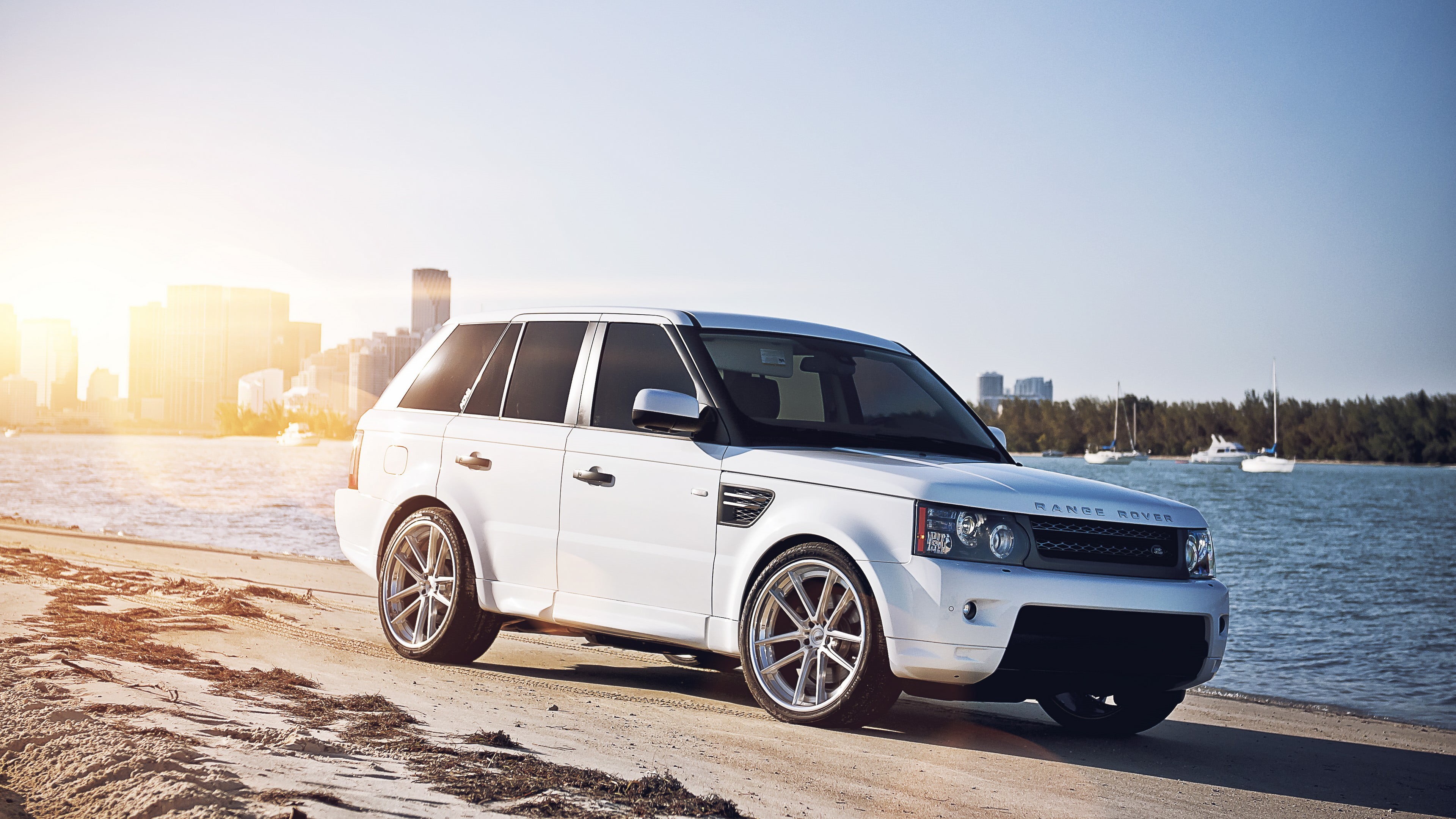 transportation, cityscape, land vehicle, white, hatchback, travel, sky, Range Rover, wheel, motor vehicle, 4K, lens flare, outdoors, luxury, clear sky, HD Wallpaper