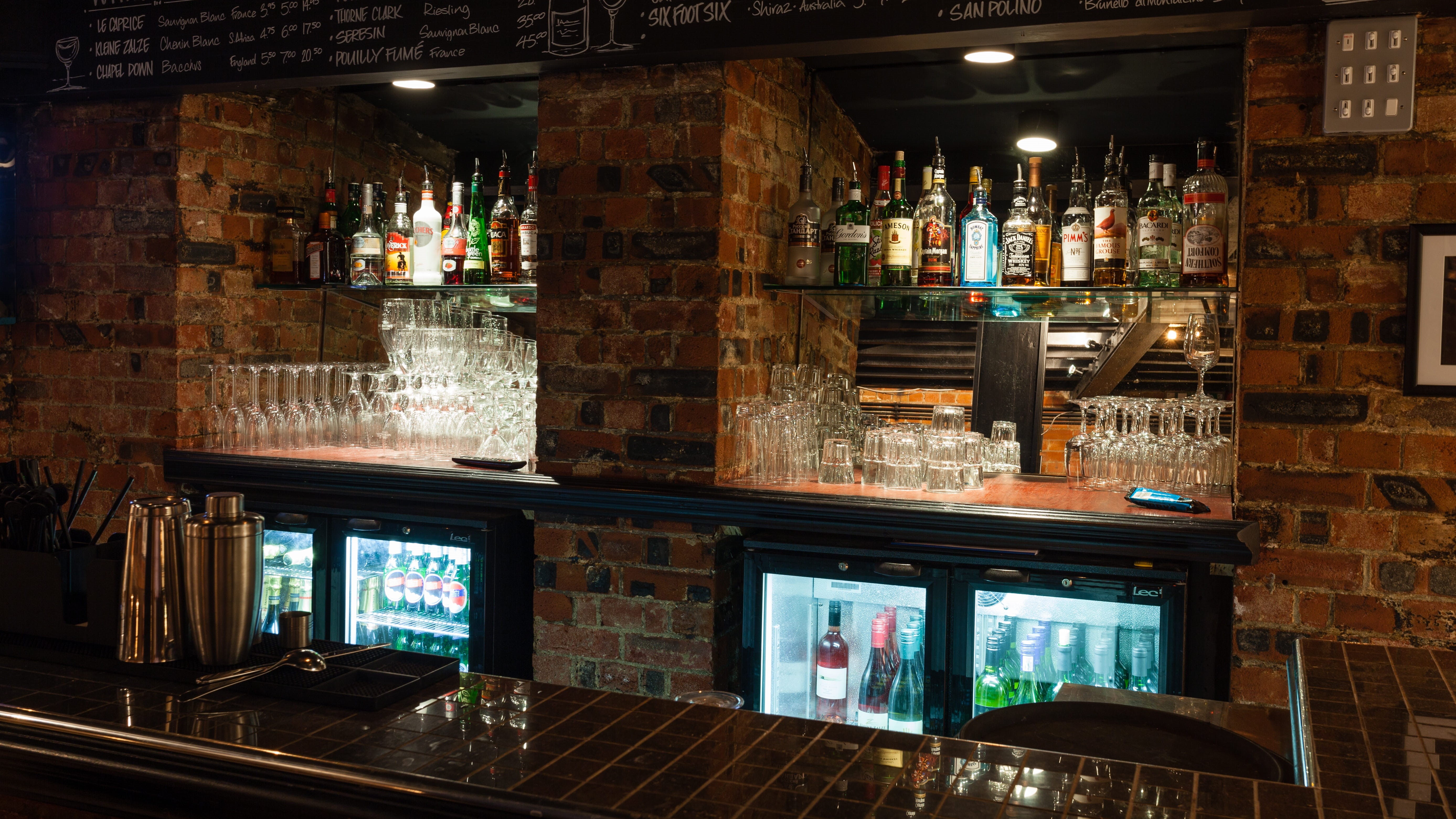 bar counter, illuminated, publication, alcoholic, built structure, communication, 5K, store, Bottles, wall, brick, glass, collection, brick wall, no people, HD Wallpaper