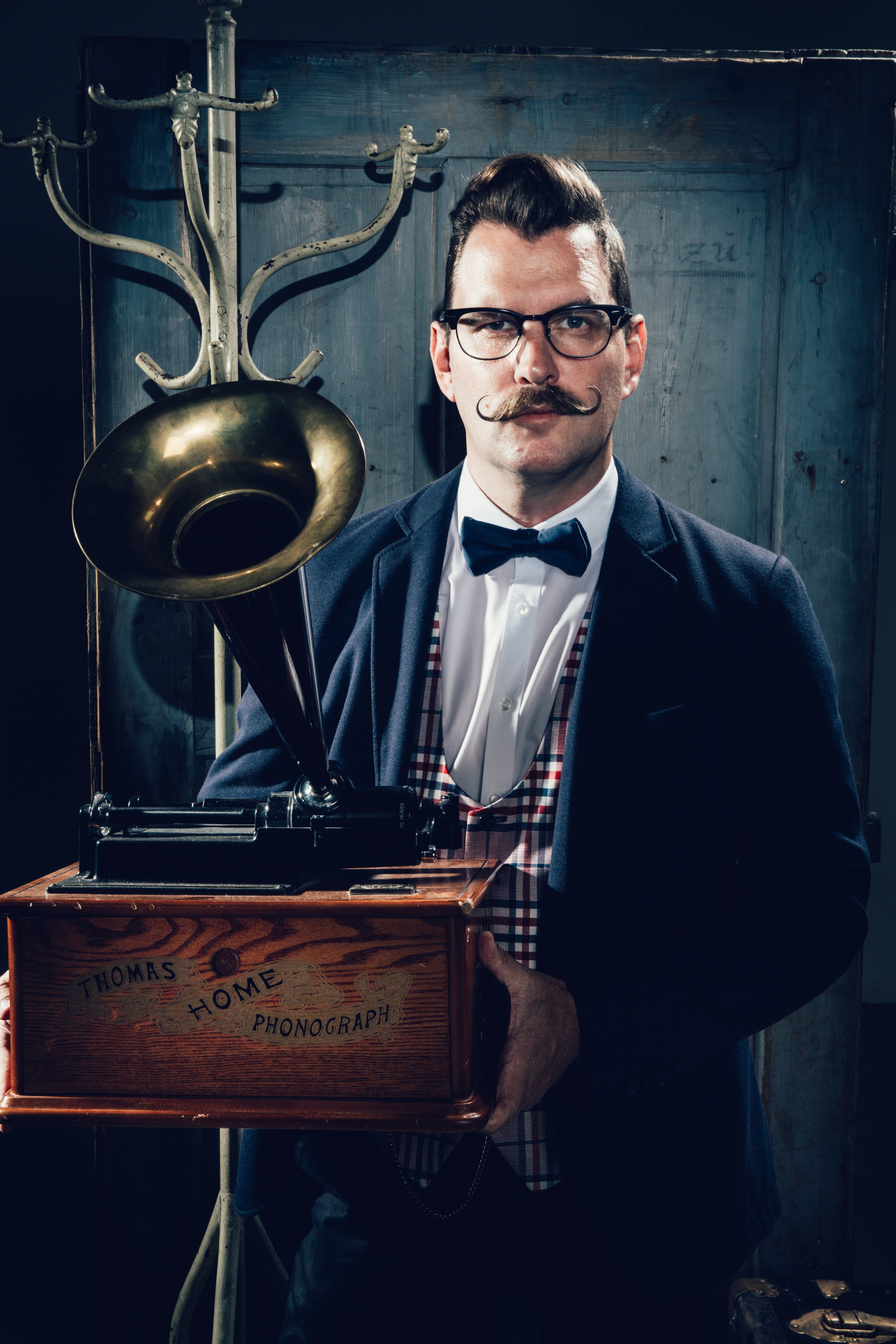 indoors, standing, glasses, young men, men, antique, portrait, shop, vinyl, dj, smiling, real people, waist up, vintage, edison, nostalgia, music, retro, Phone HD Wallpaper