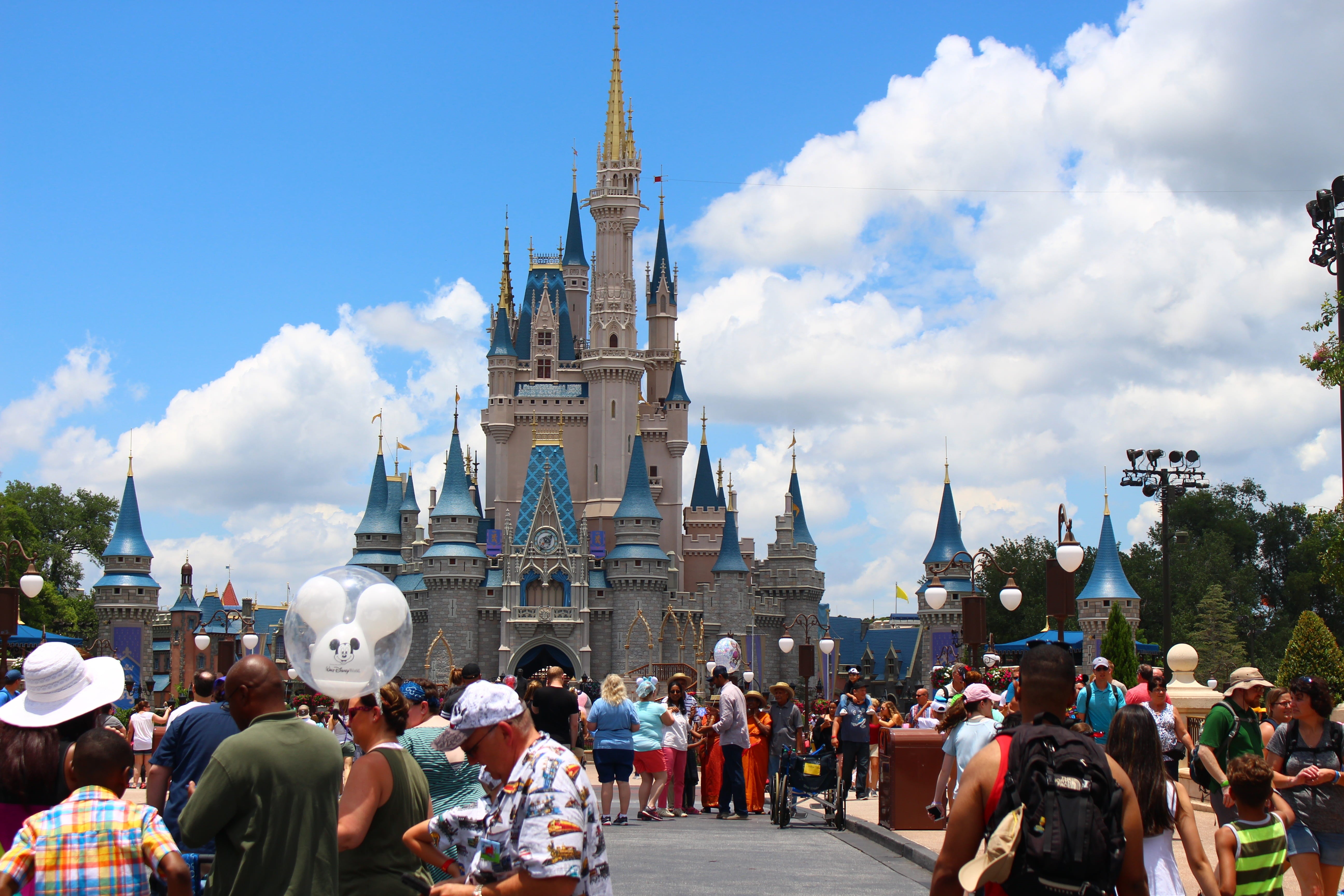 real people, resort, destination, people, orlando florida, cloud - sky, built structure, park, belief, daytime, tourism, spirituality, spire, architecture, HD Wallpaper