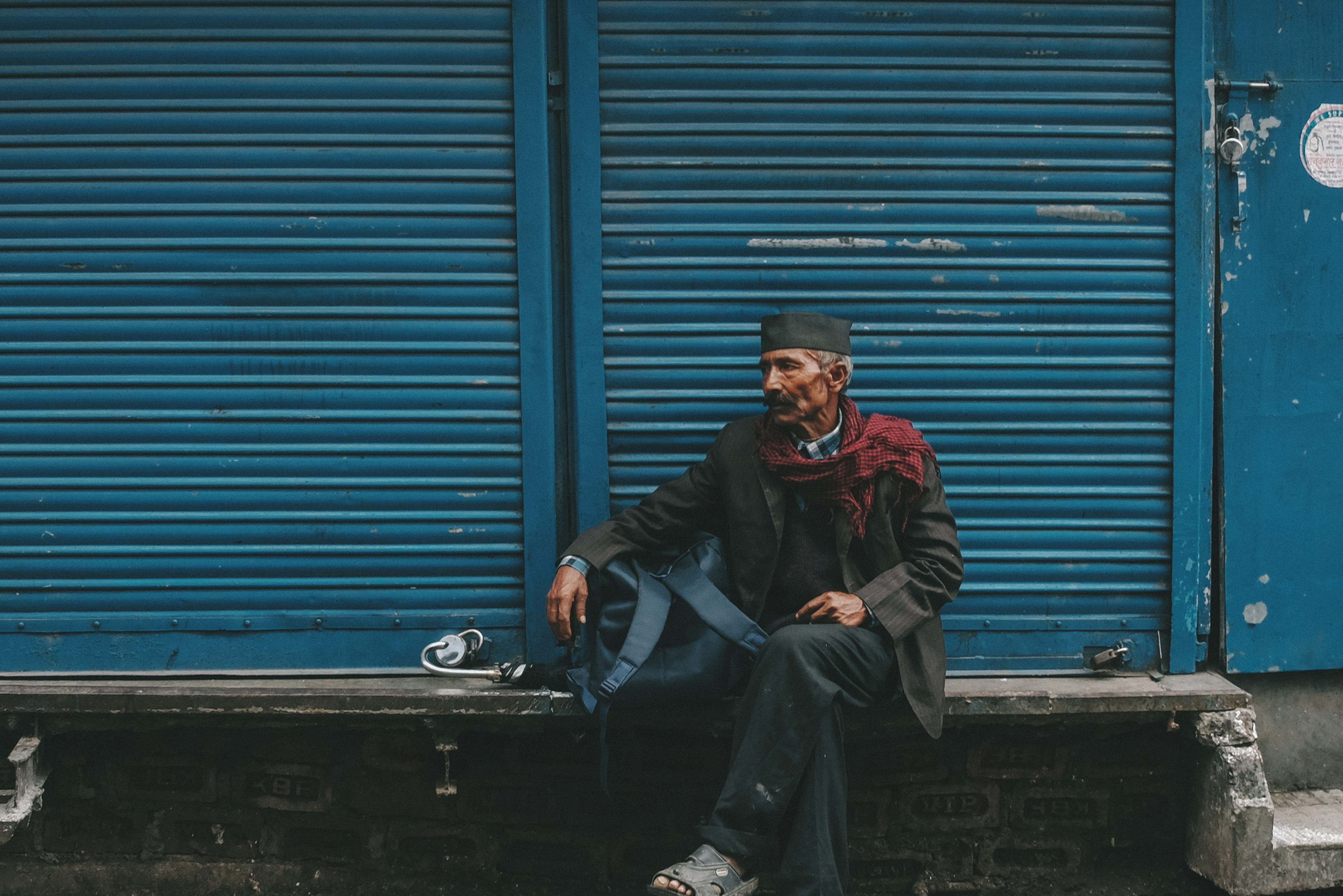 iron, backpack, clothing, closed, streetscape, concrete, metal, person, portrait, architecture, shutter, retro, wall, blue, casual clothing, gray, front, HD Wallpaper