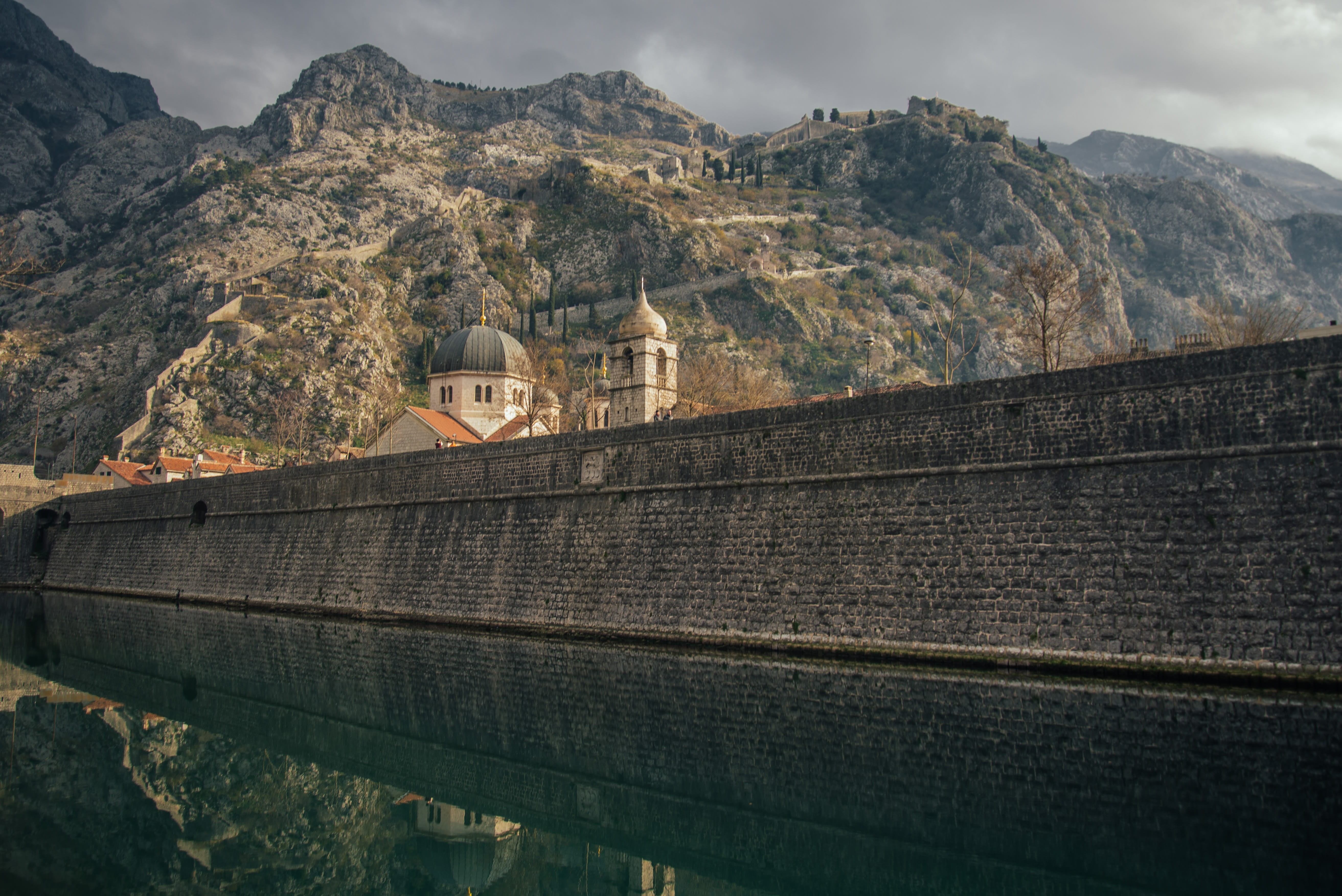 midevel, water, ruins, sky, travel destinations, the past, wall, ancient, history, cloud - sky, ortodox, montenegro, mountain peak, mountain range, built structure, HD Wallpaper