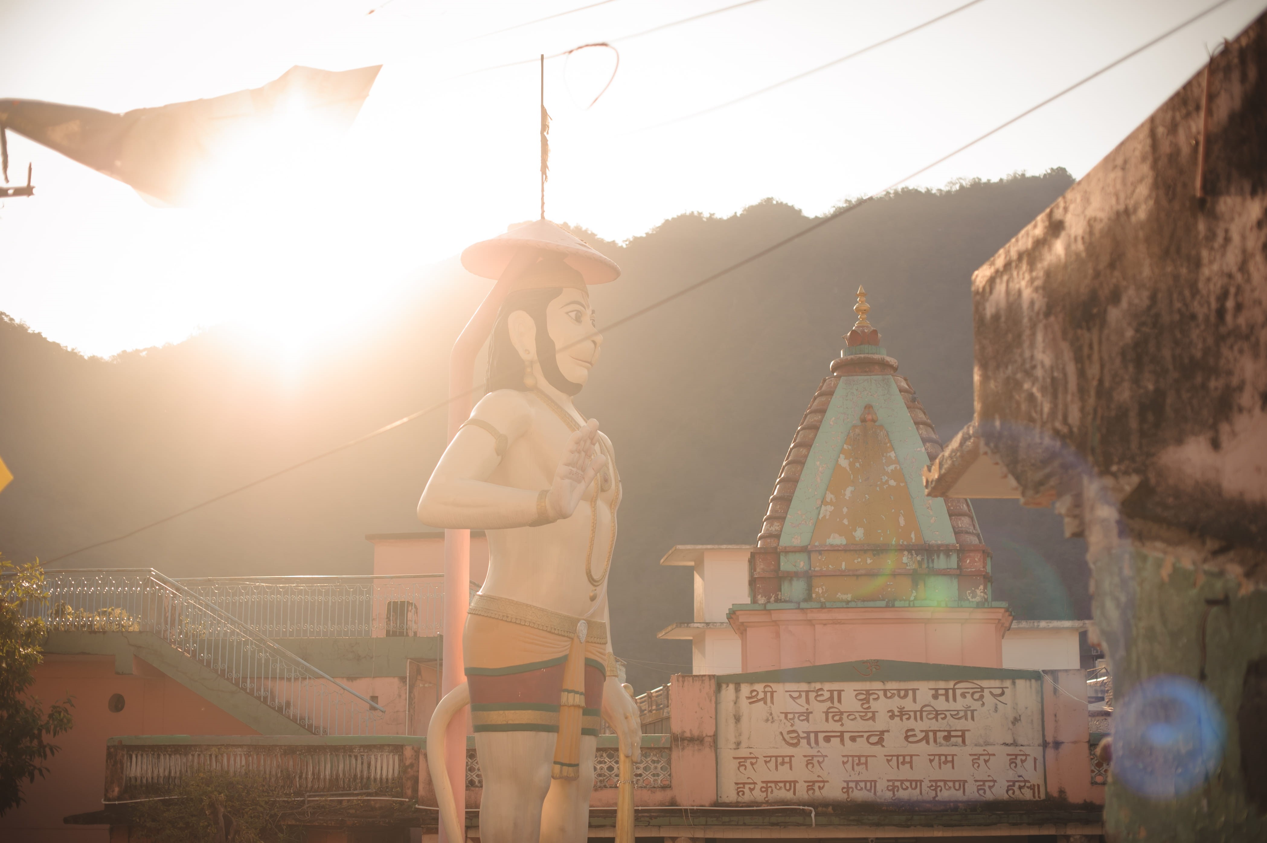 mountains, young women, clothing, built structure, architecture, hanuman, building, rishhikesh, sky, lifestyles, sunlight, building exterior, beautiful woman, HD Wallpaper