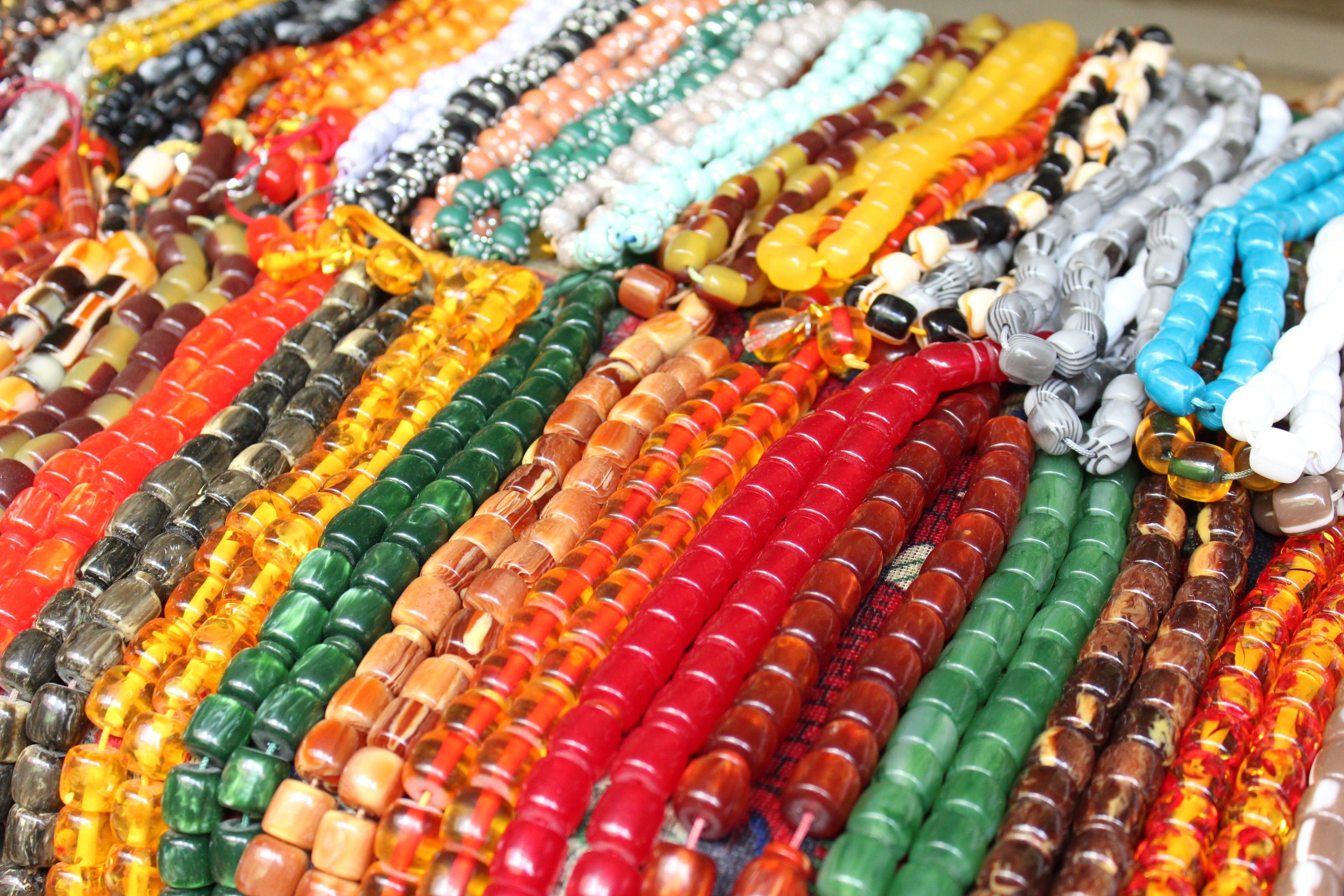 for sale, backgrounds, high angle view, close-up, ornament, in a row, color, indoors, bracelet, retail, multi colored, large group of objects, beads, abundance, HD Wallpaper