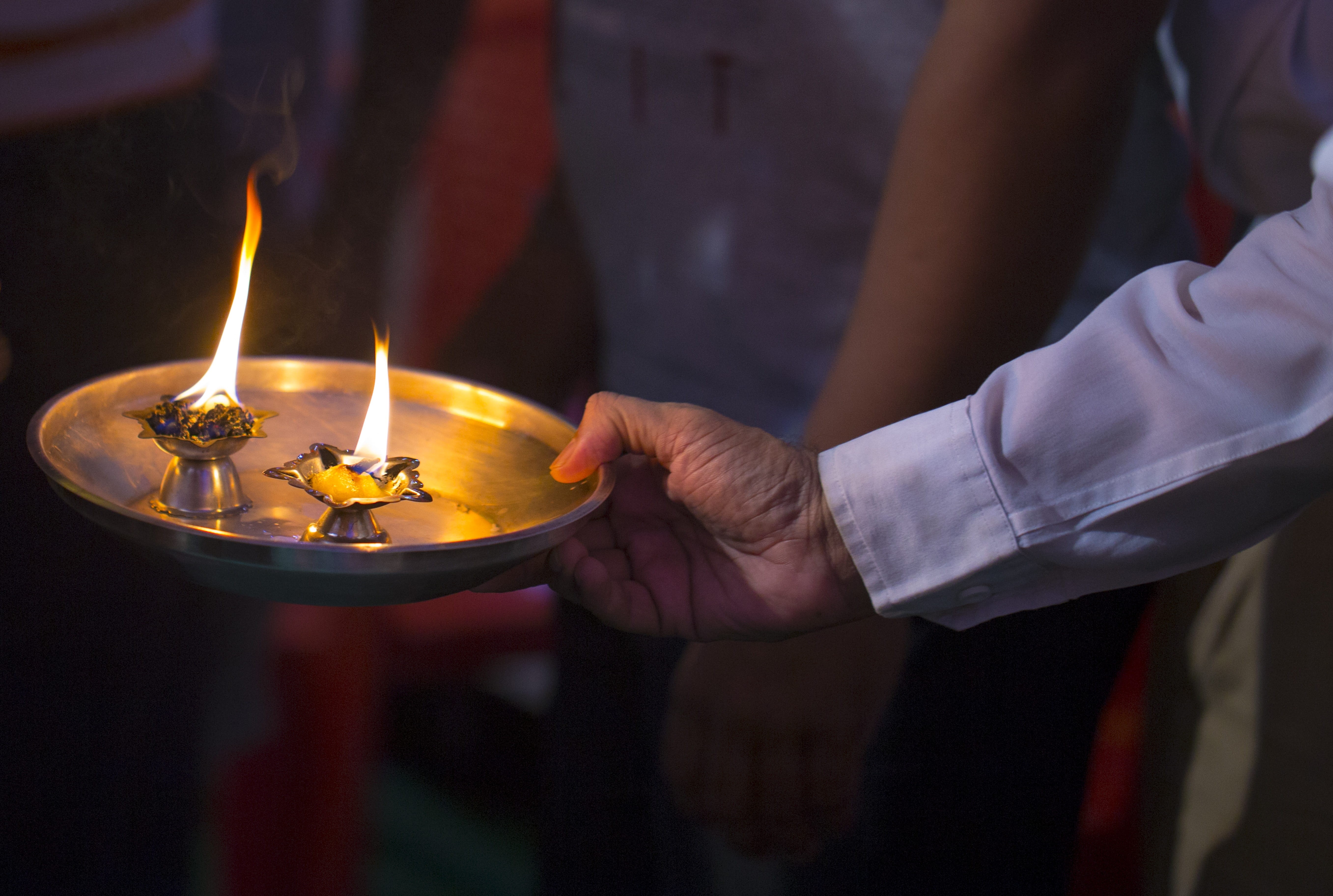 burning, fire, fire - natural phenomenon, human hand, religion, 5K, flame, holding, event, puja, hand, one person, heat - temperature, midsection, hindu, HD Wallpaper