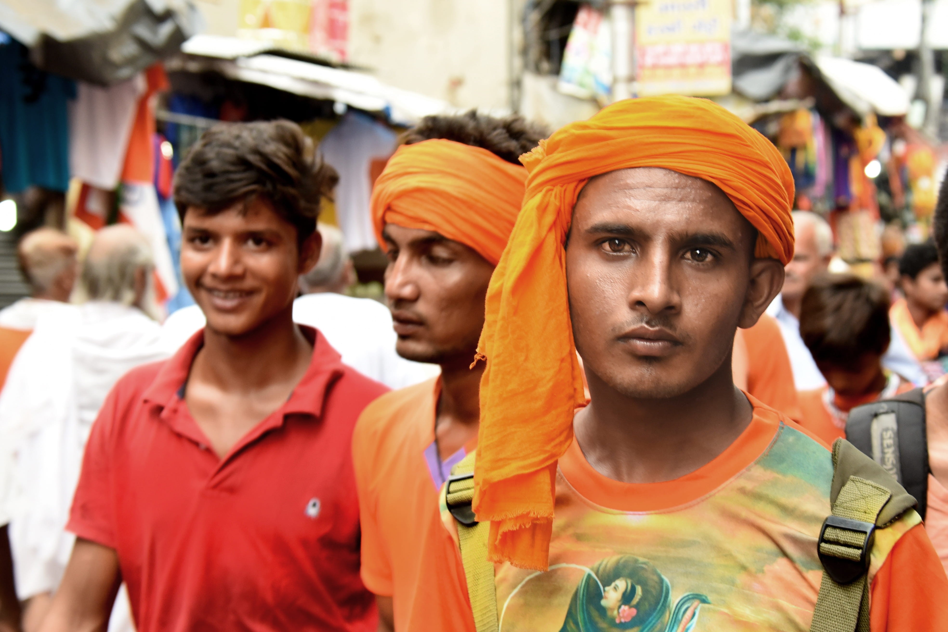 focus on foreground, front view, group of people, gaze, real people, headshot, business, holi, portrait, occupation, day, young adult, orenge, 4K, india, HD Wallpaper
