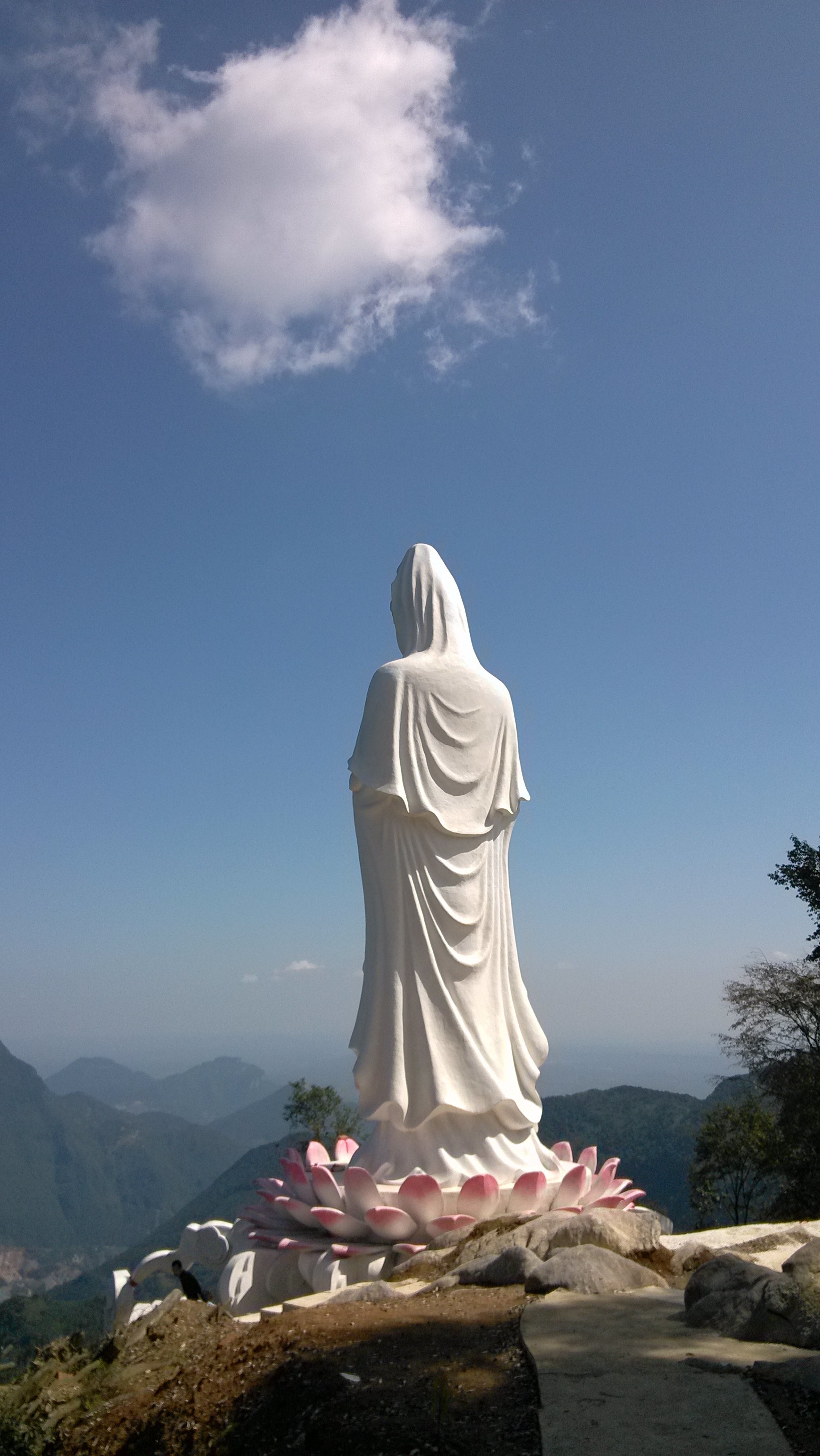 sunlight, no people, sculpture, sky, medicine king valley, male likeness, creativity, belief, beauty in nature, solid, statue, cloud - sky, guanyin, female likeness, Phone HD Wallpaper