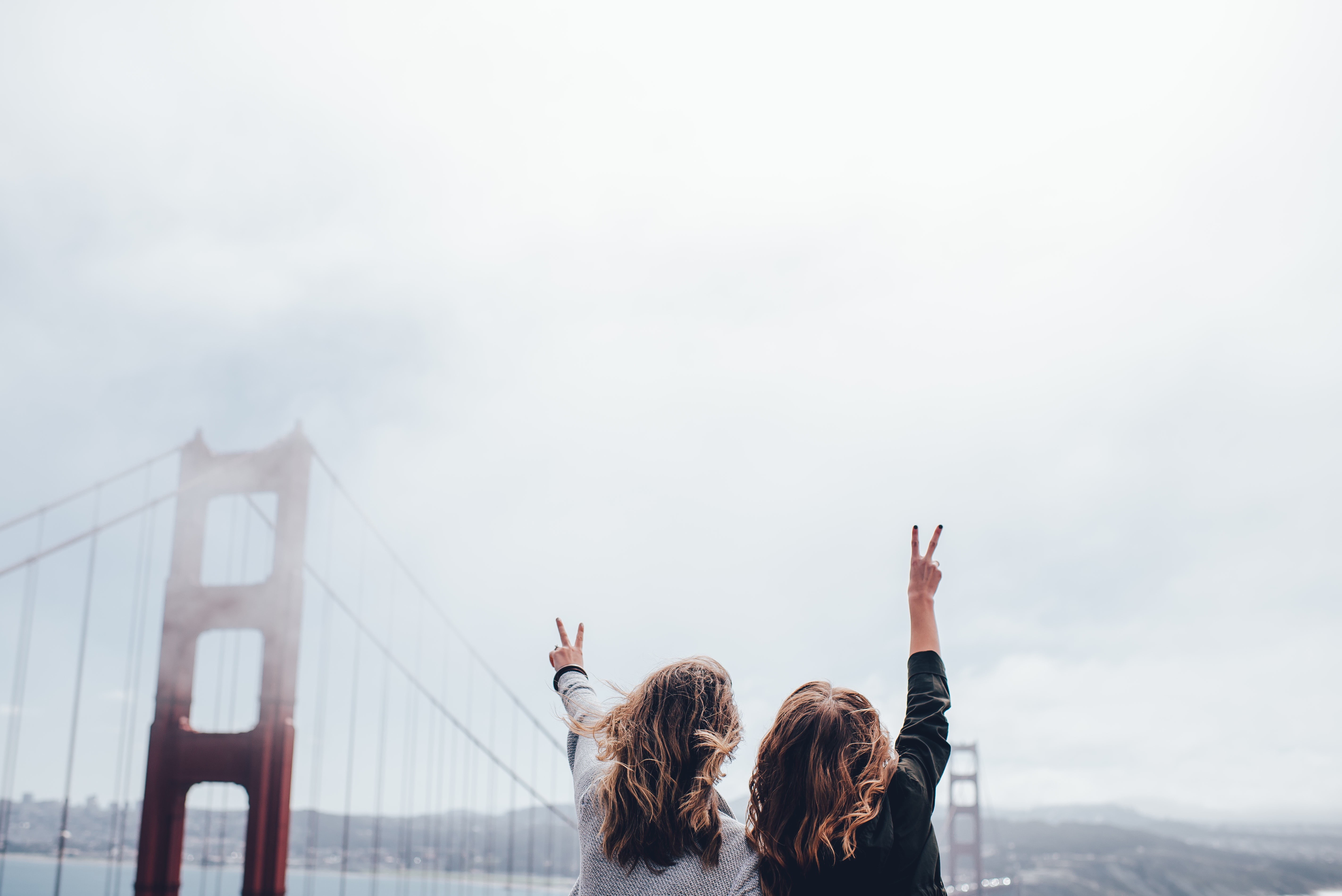 limb, headshot, peace, clouds, day, women, hair, bridge, leisure activity, human arm, arms raised, girls, rear view, cloudy, portrait, friends, one woman only, HD Wallpaper