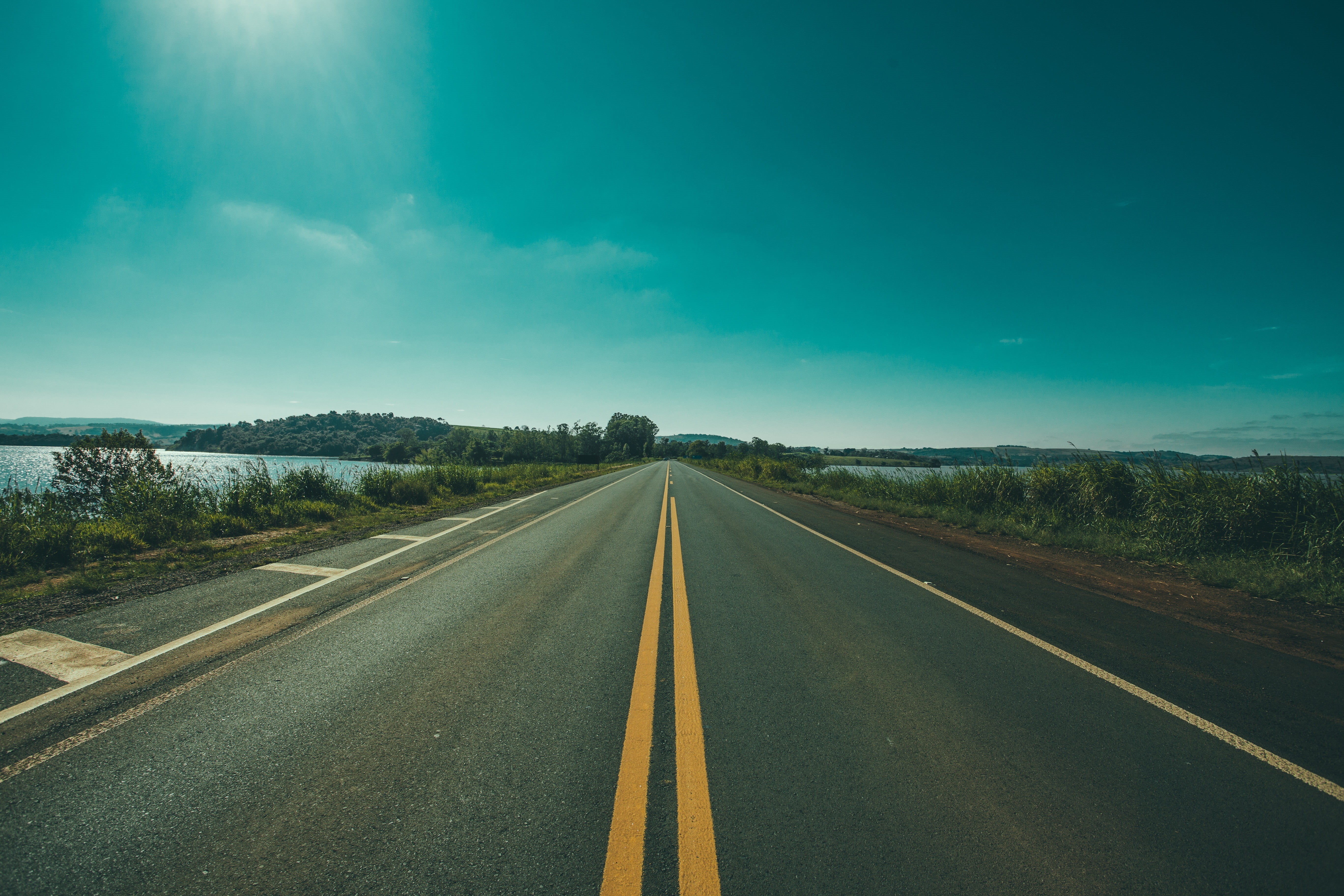 blue, transportation, double yellow line, outdoors, water, 5K, direction, diminishing perspective, vanishing point, cloud - sky, long, empty road, sign, HD Wallpaper