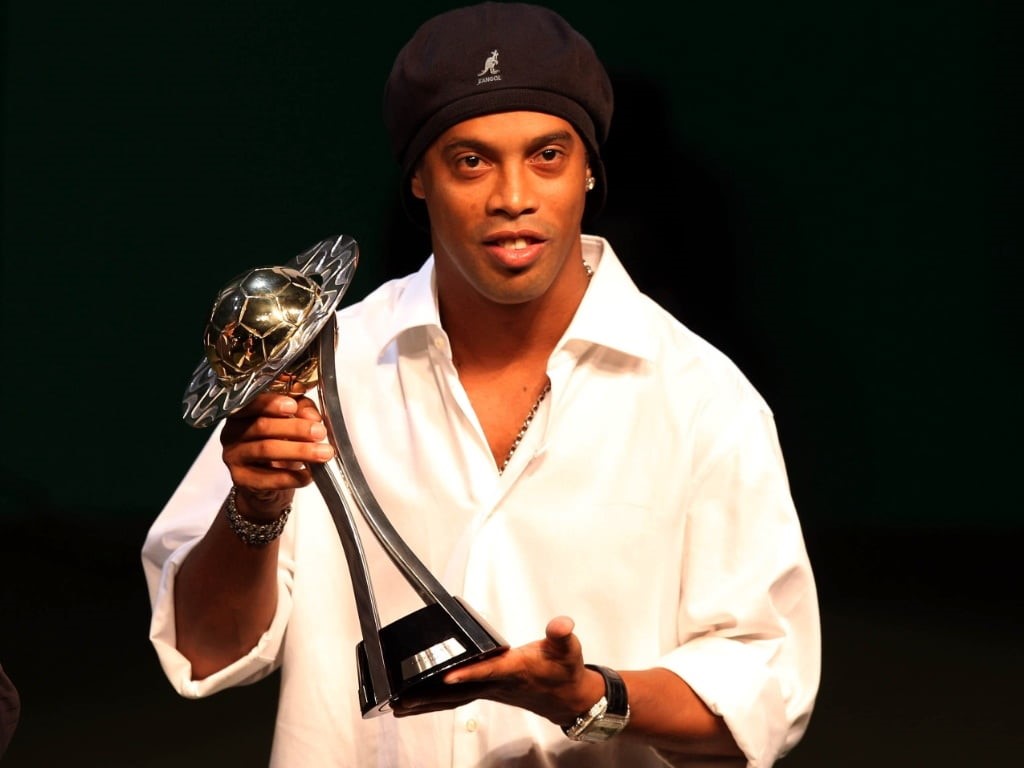 uniform, young adult, ronaldinho, holding, Sports, portrait, studio shot, young men, 480P, waist up, indoors, clothing, occupation, standing, real people, HD Wallpaper