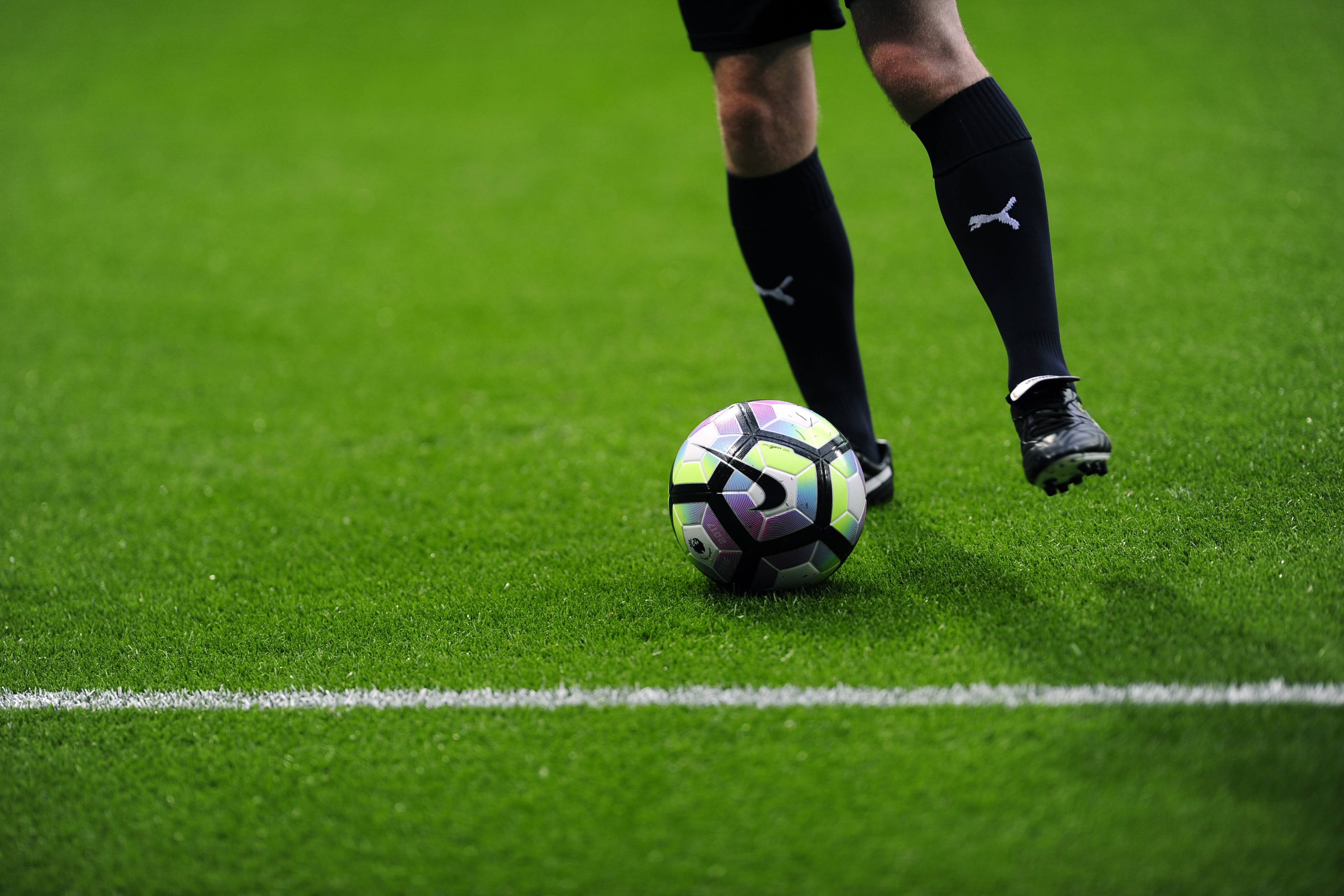 low section, human leg, grass, competition, playing, soccer field, sports clothing, football, green color, 4K, legs, world Cup, sport, plant, body part, HD Wallpaper