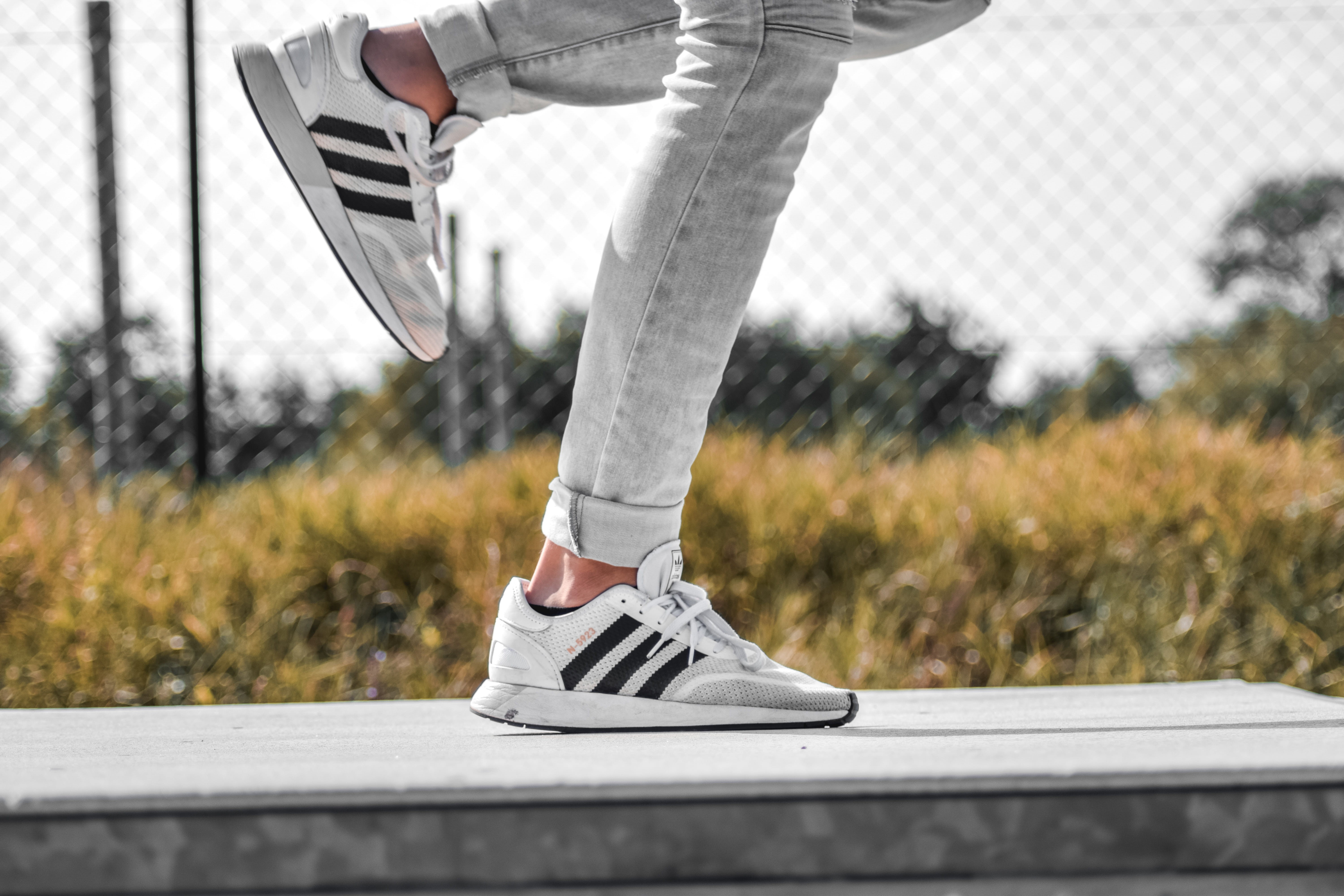 lifestyles, sneakers, sneaker, wearing, limb, motion, shoe, body part, one person, running shoe, person, day, human limb, clothing, leisure activity, 5K, HD Wallpaper