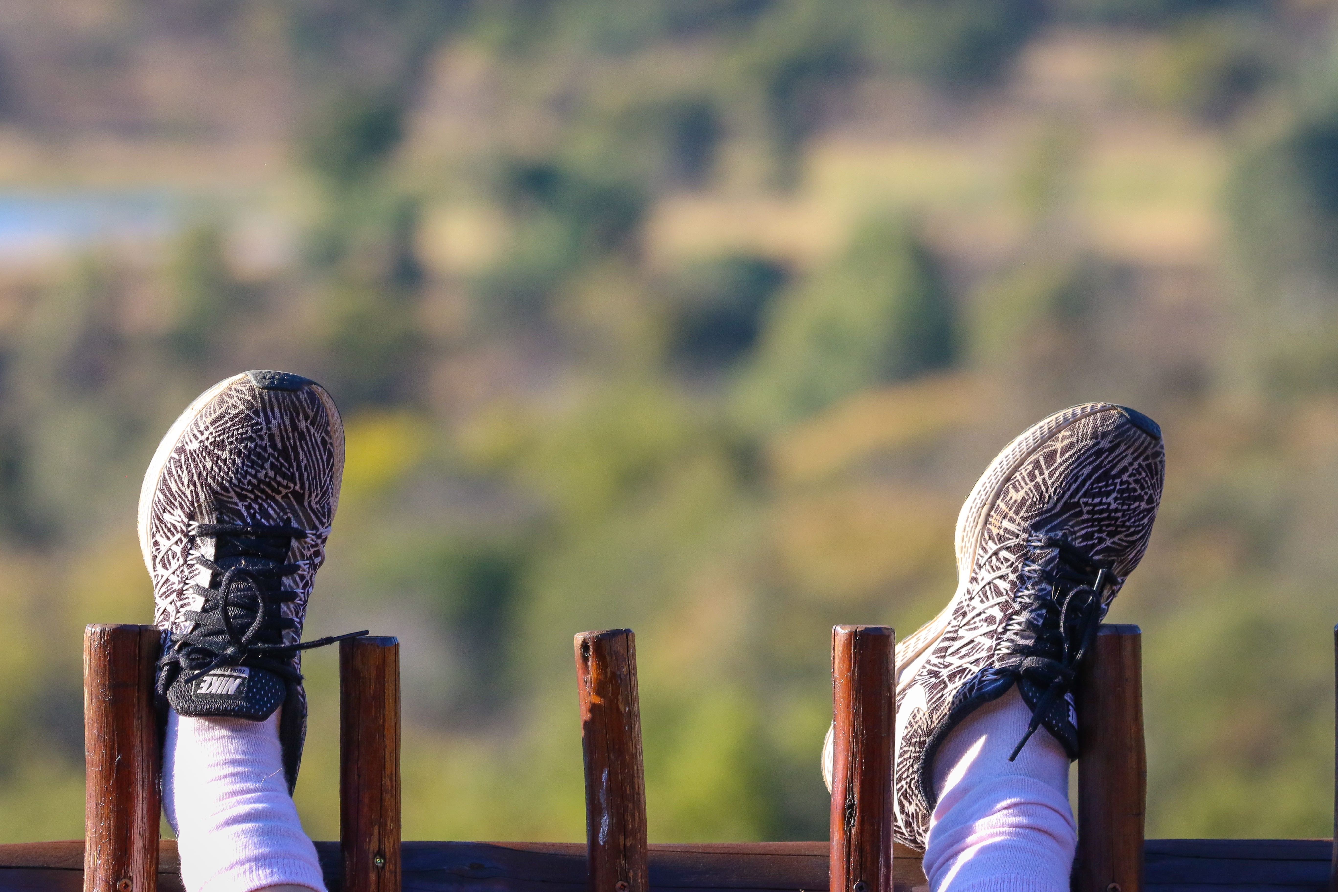 barrier, relaxation, fence, metal, railing, nature, daylight, wood - material, feet, day, art and craft, focus on foreground, no people, shoes, human representation, HD Wallpaper
