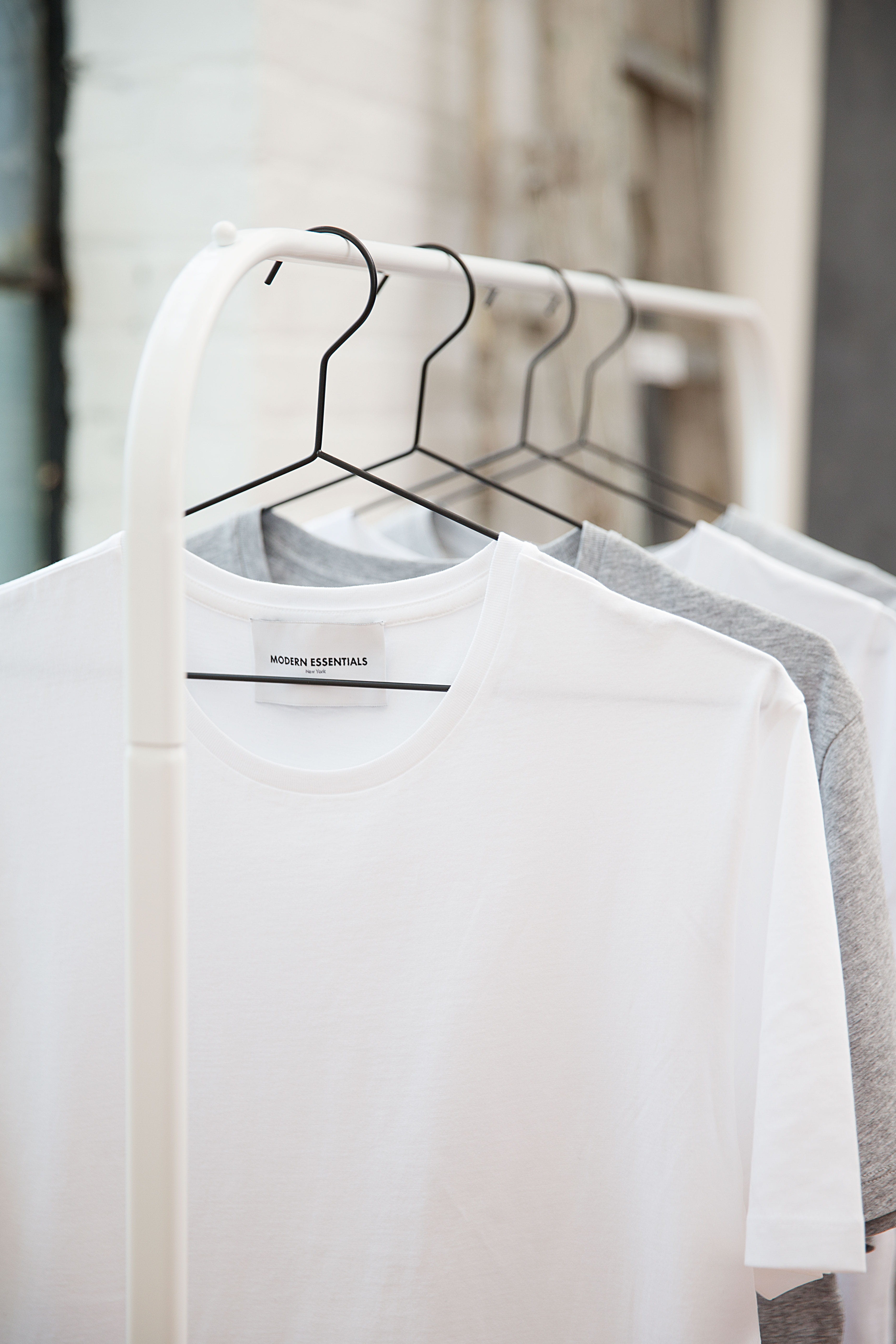 hanger, hanging, clean, chair, still life, textile, close-up, 5K, clothes, fashion, store, coathanger, brand, luxury, day, seat, minimal, modernessential, Phone HD Wallpaper