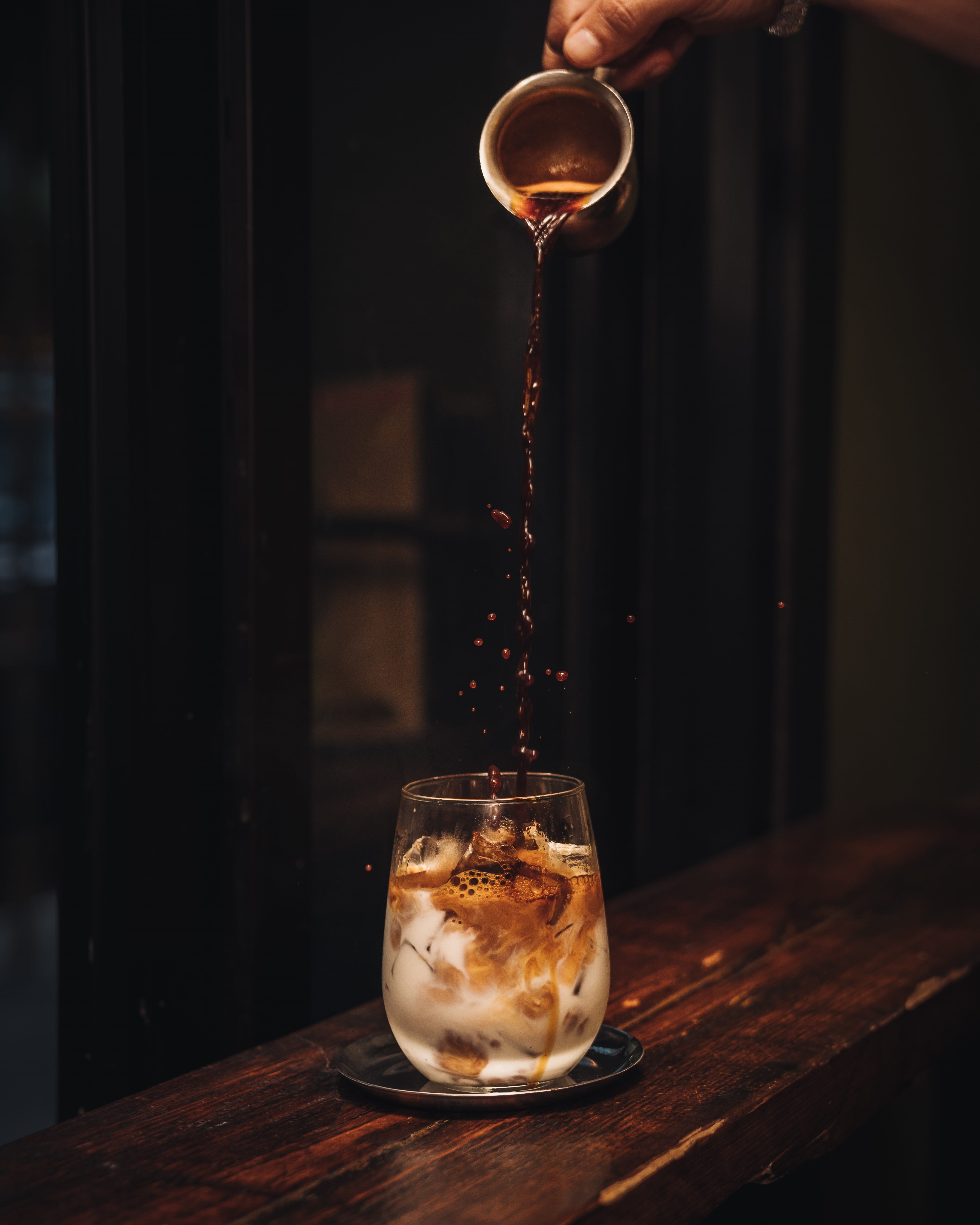 water, espresso, 5K, transparent, drops, pouring, hand, table, close-up, no people, cold temperature, glass, household equipment, indoors, still life, Phone HD Wallpaper