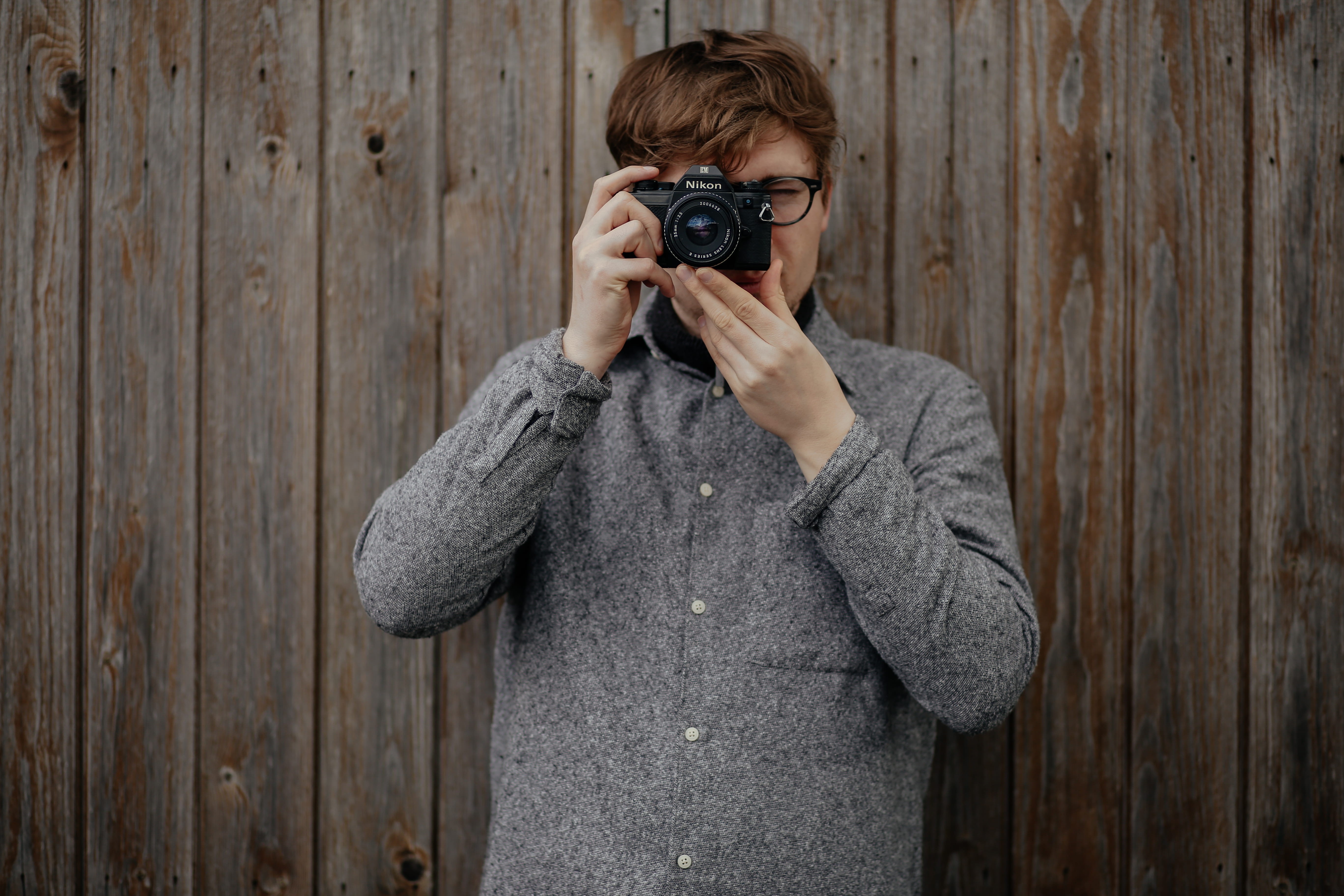old-fashioned, man, outdoors, wooden, copy Space, looking, dslr, leisure activity, holding, wall, people, gray, photography Themes, man in  gray, photo, HD Wallpaper