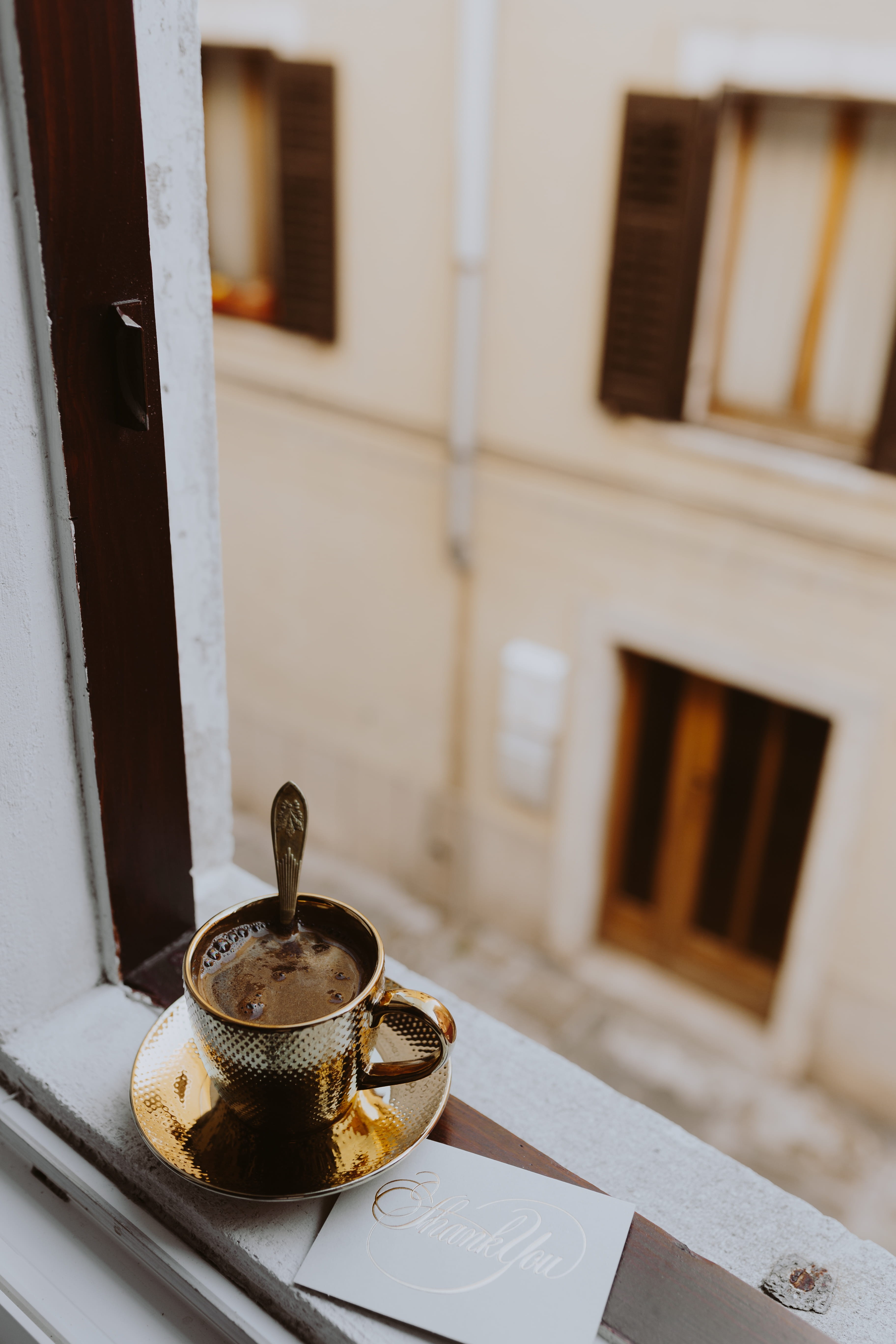 coffee cup, kitchen utensil, gold cup, mug, table, slovenia, golden, tea, food and drink, cup, no people, morning, hot drink, window, black coffee, drink, Phone HD Wallpaper