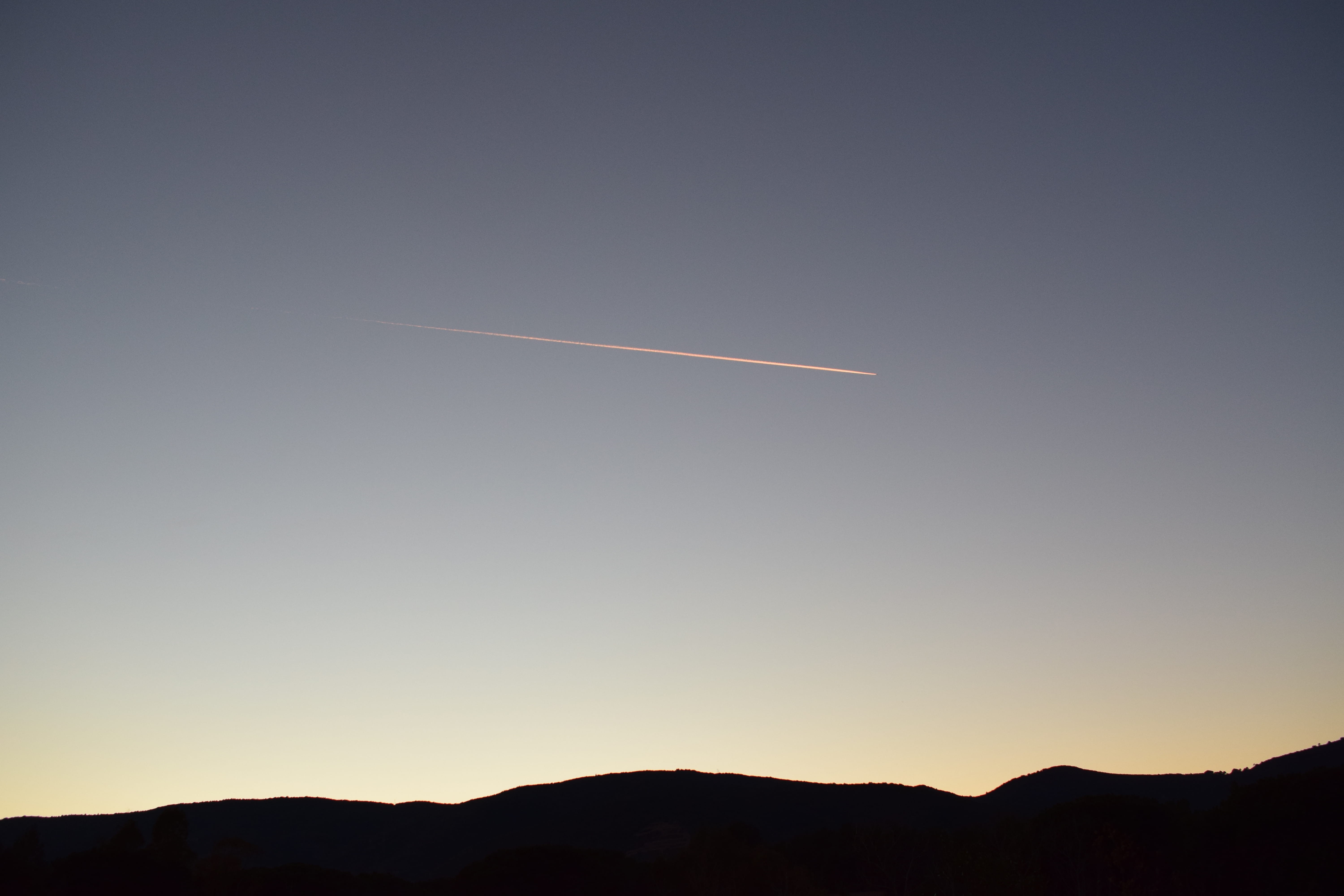 copy space, sunset, no people, motion, sky, low angle view, airplane, light, plane, italy, beauty in nature, mountain, mountains, scenics - nature, silhouette, HD Wallpaper