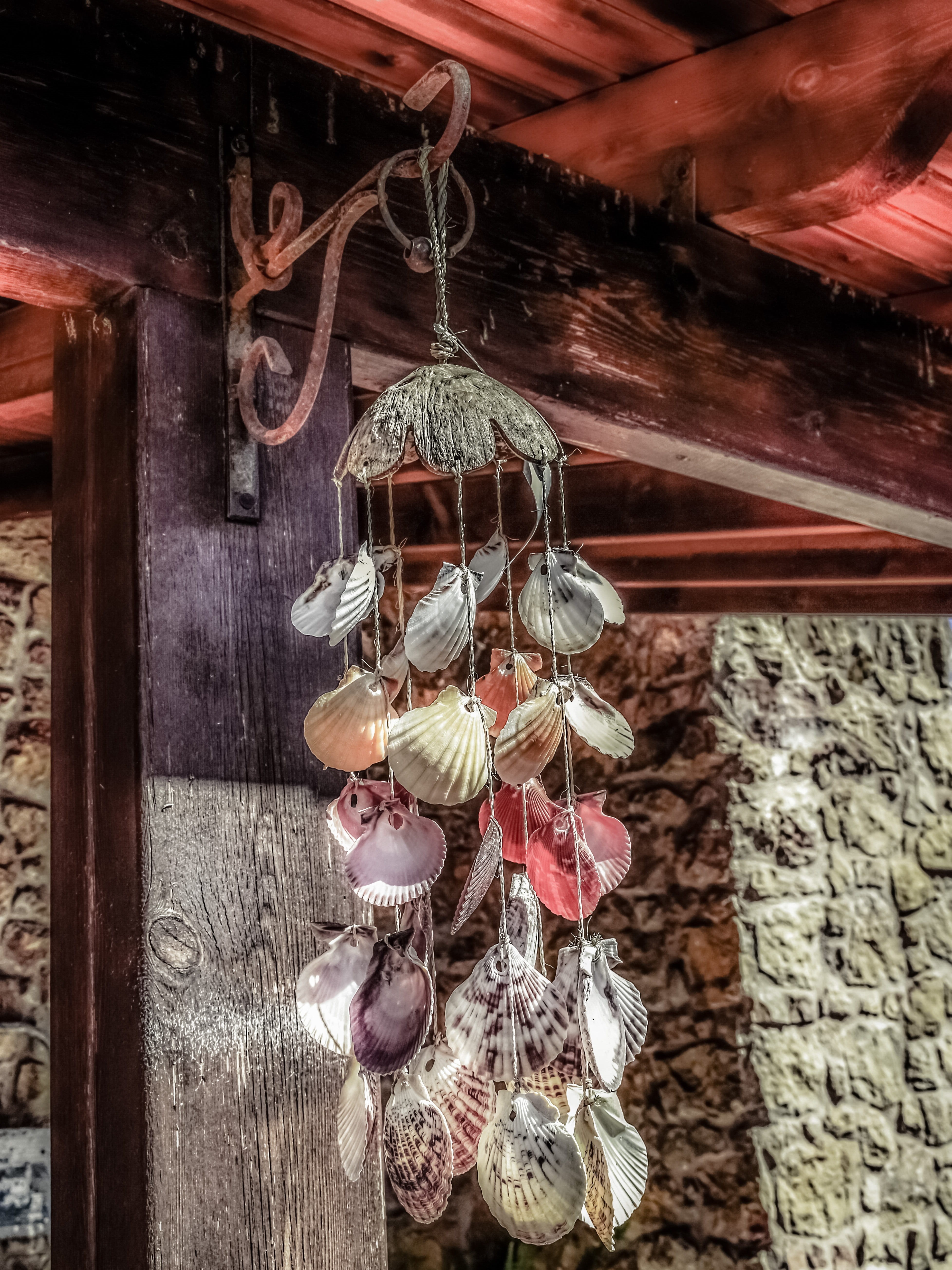 indoors, windspiel, day, wood - material, low angle view, focus on foreground, lighting equipment, ceiling, no people, nature, string, wind chime, religious equipment, Phone HD Wallpaper