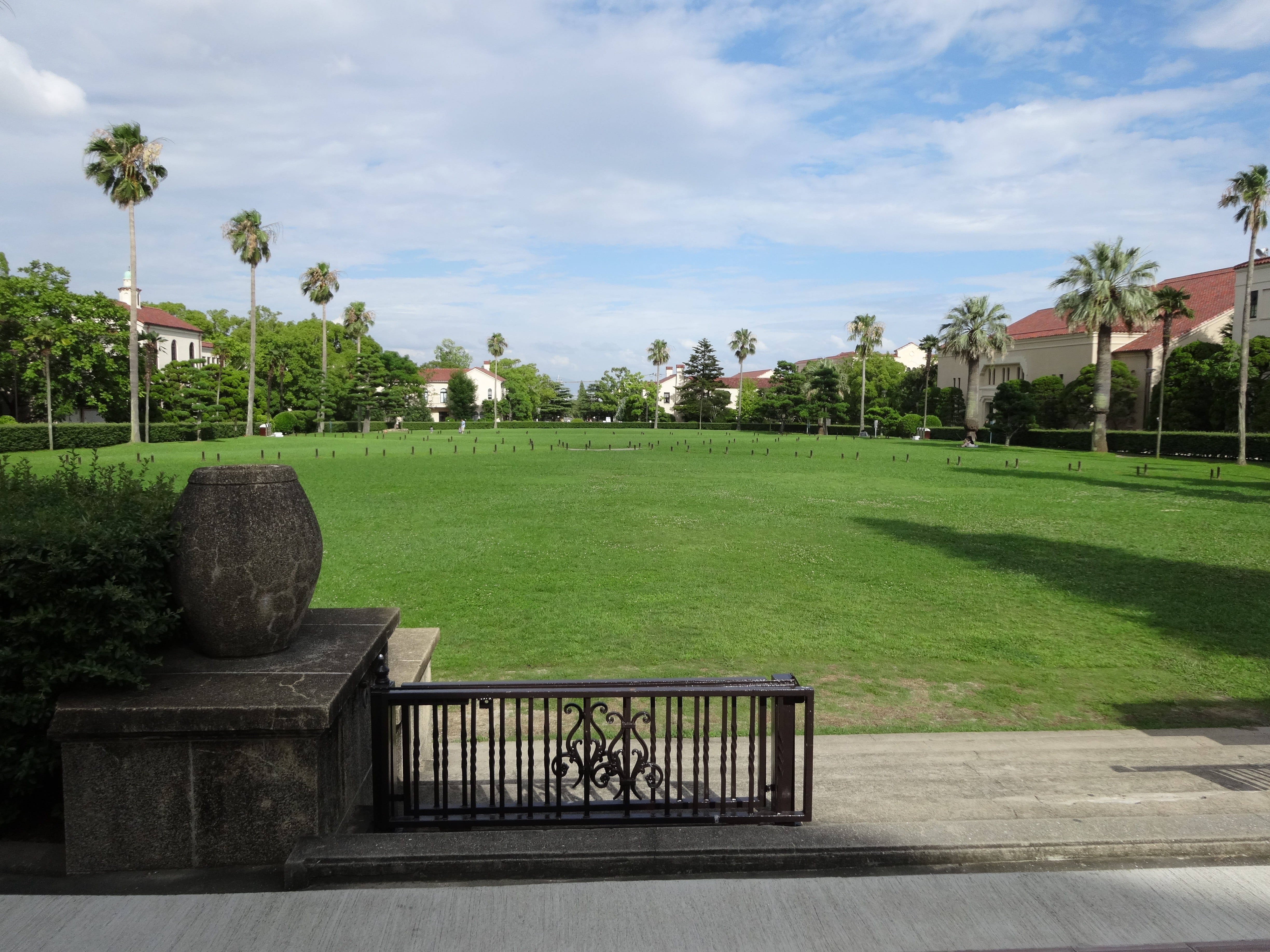 outdoors, no people, grass, footpath, tree, campus, architecture, sky, nature, tranquil scene, day, park, lawn, tranquility, plant, built structure, palm tree, HD Wallpaper