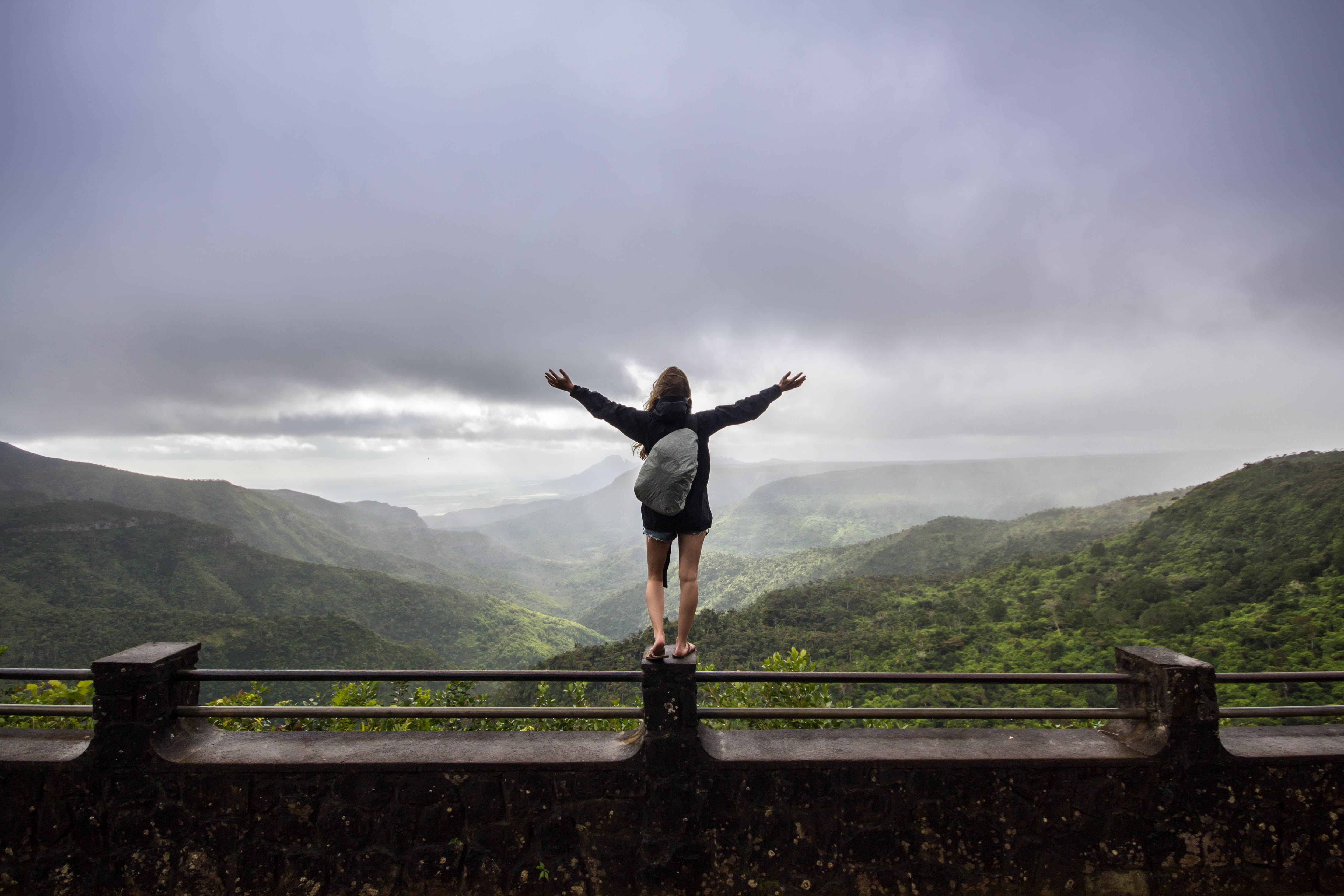 non-urban scene, gorges viewpoint, real people, banister, green, person, standing, concrete, weather, maritius, cloud - sky, arms outstretched, human, rear view, HD Wallpaper