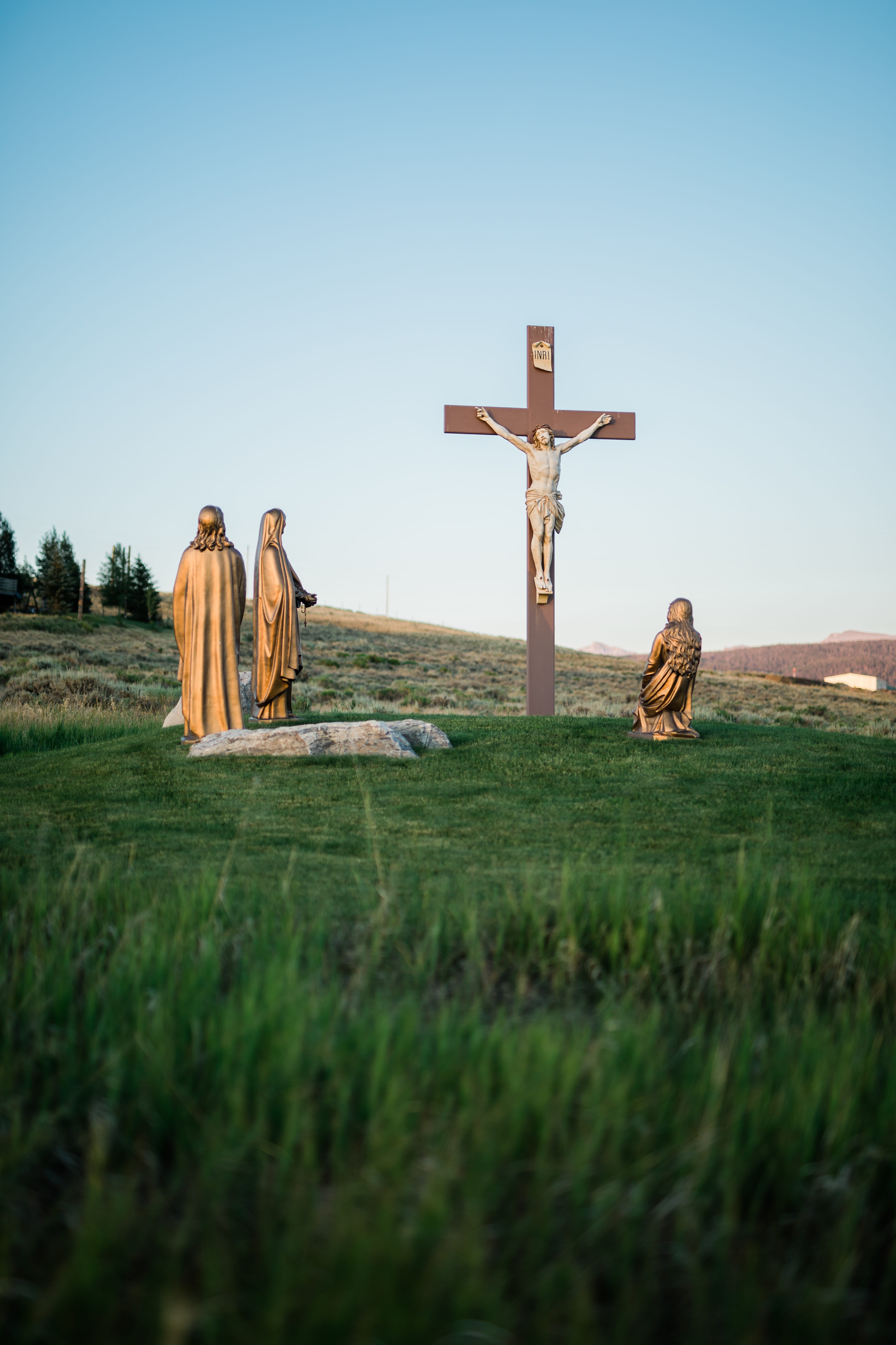 crucifix, 5K, christ, passion, sculpture, plant, cross, religion, cloak, human representation, outdoors, art, representation, art and craft, no people, Phone HD Wallpaper