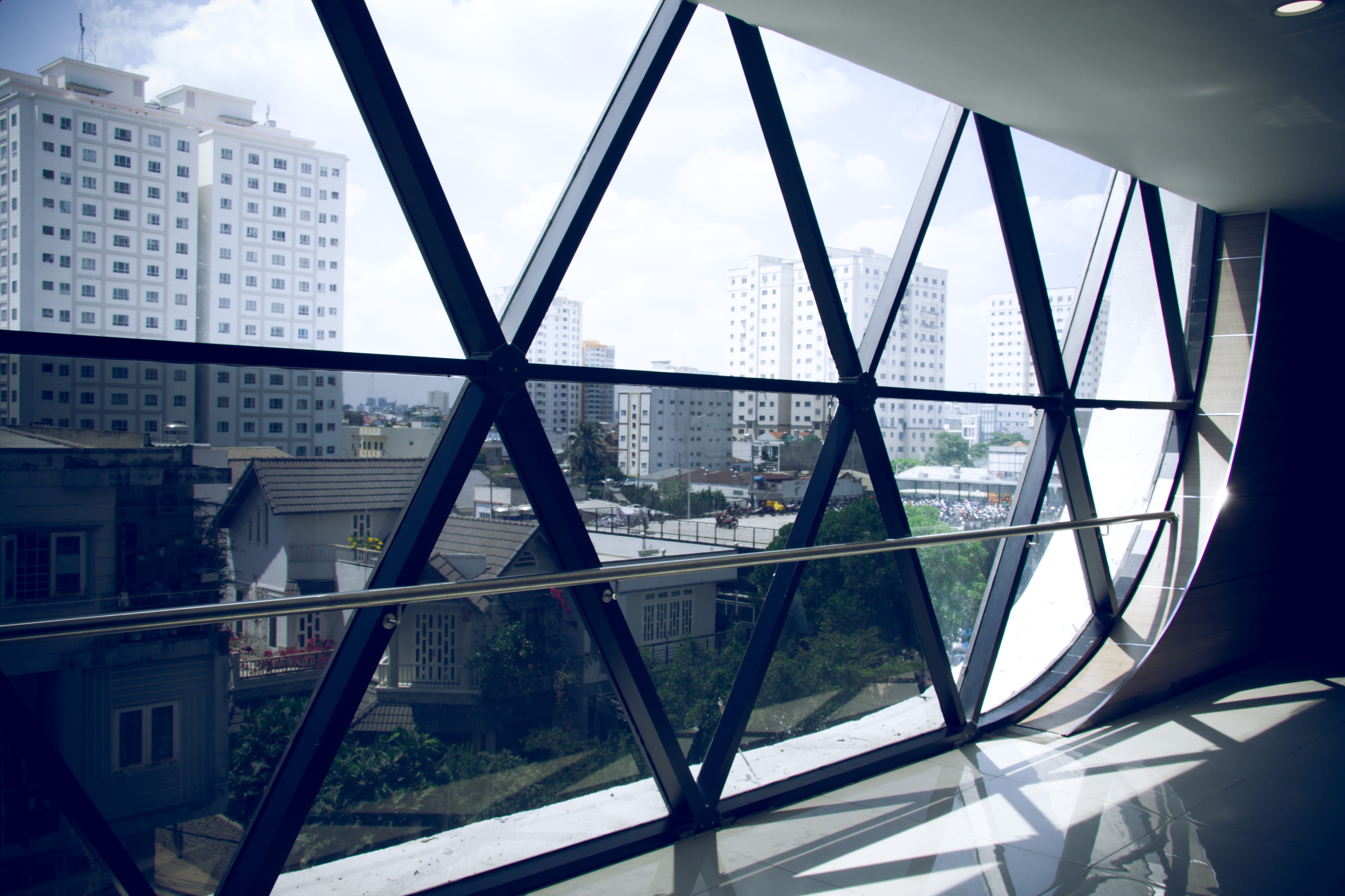 inside, connection, window, day, cityscape, 4K, no people, nature, building, ho chi minh city, bridge, office building, sky, triangle, transparent, built structure, HD Wallpaper