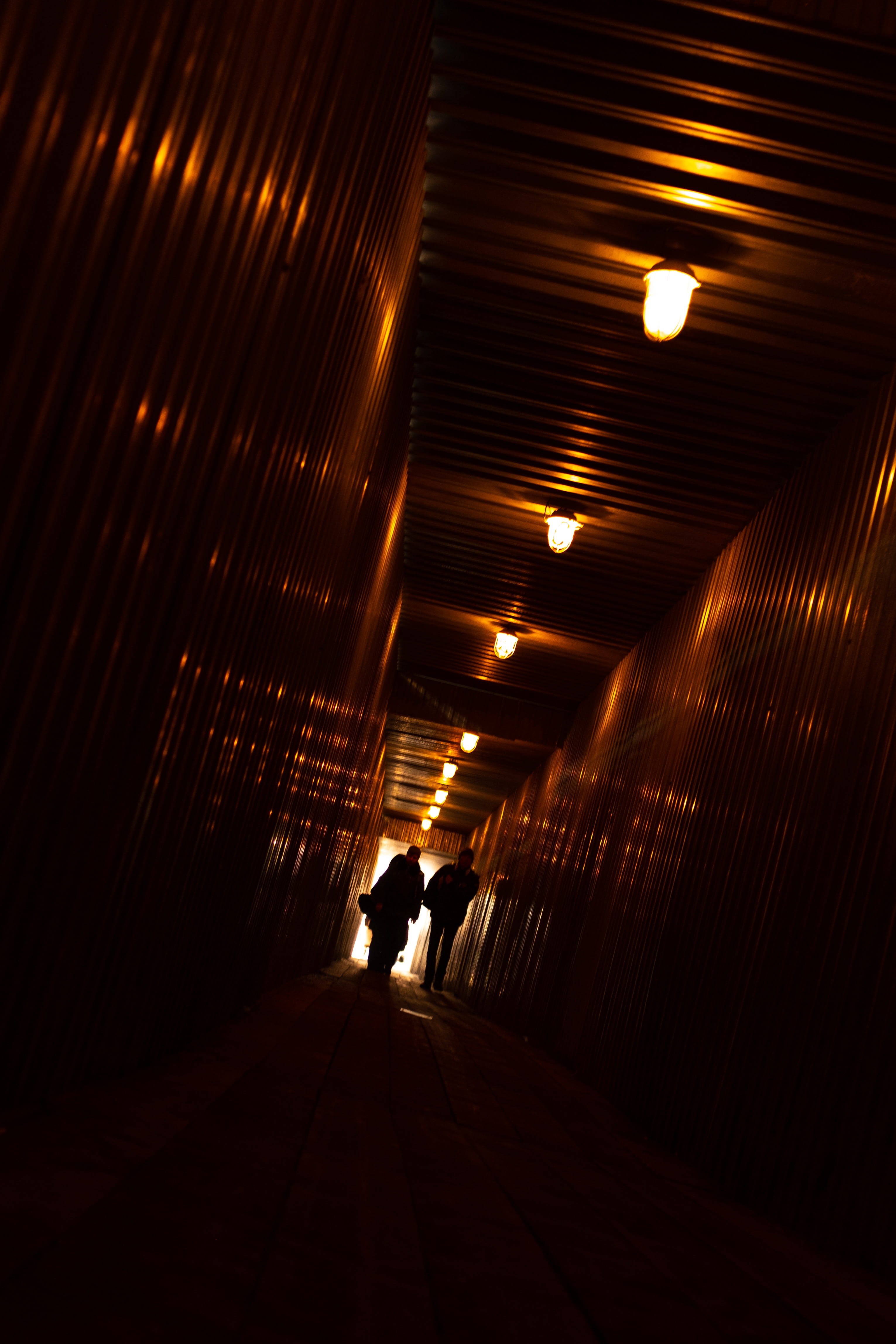 dungeon, subway, light, neon, light fixture, built structure, banister, flooring, pub, tunnel, human, night, tonnel, flare, crypt, indoors, silhouette, Phone HD Wallpaper