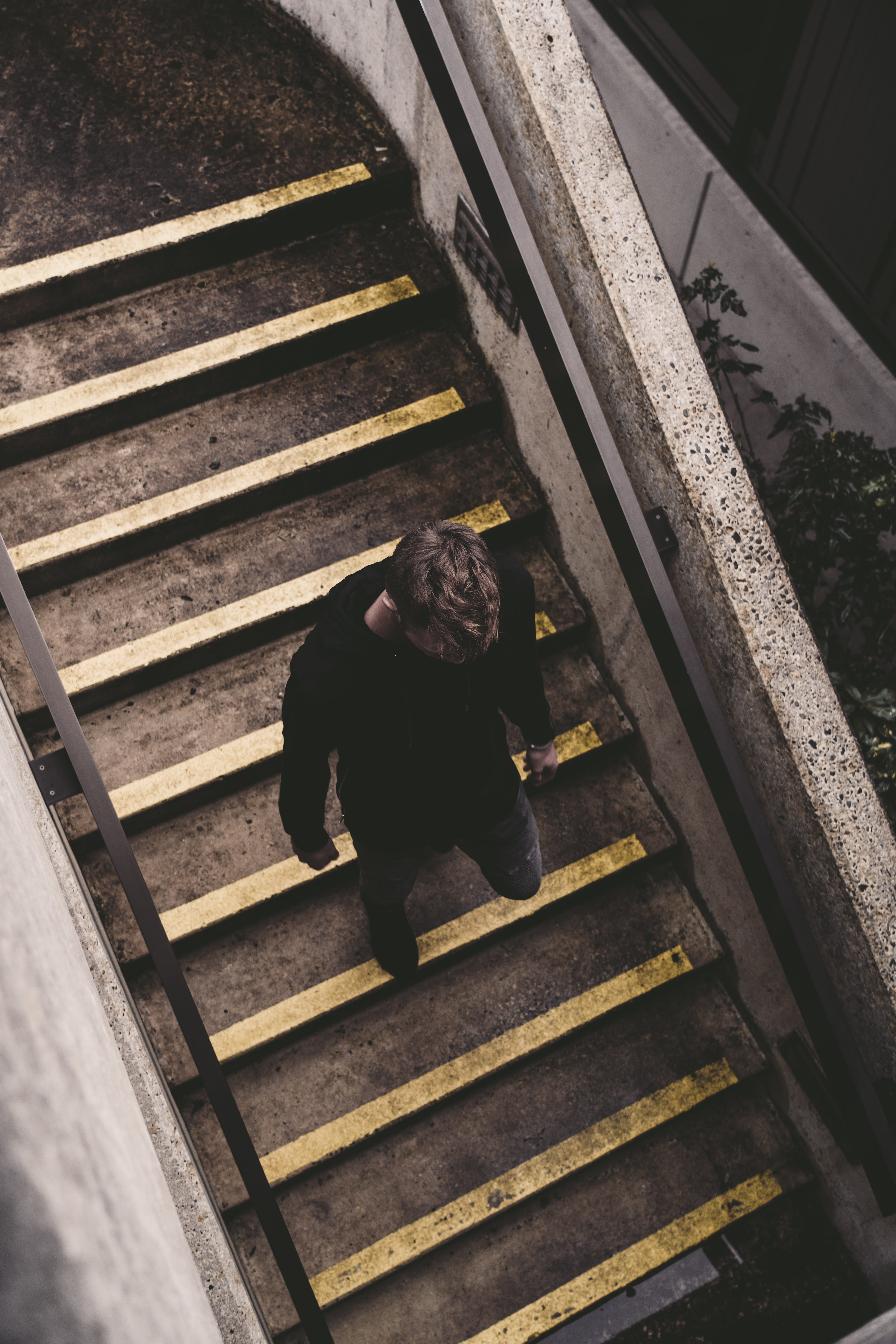 depression - sadness, leisure activity, handrail, sadness, railing, men, human, lifestyles, one person, coat, apparel, staircase, rail transportation, outdoors, Phone HD Wallpaper