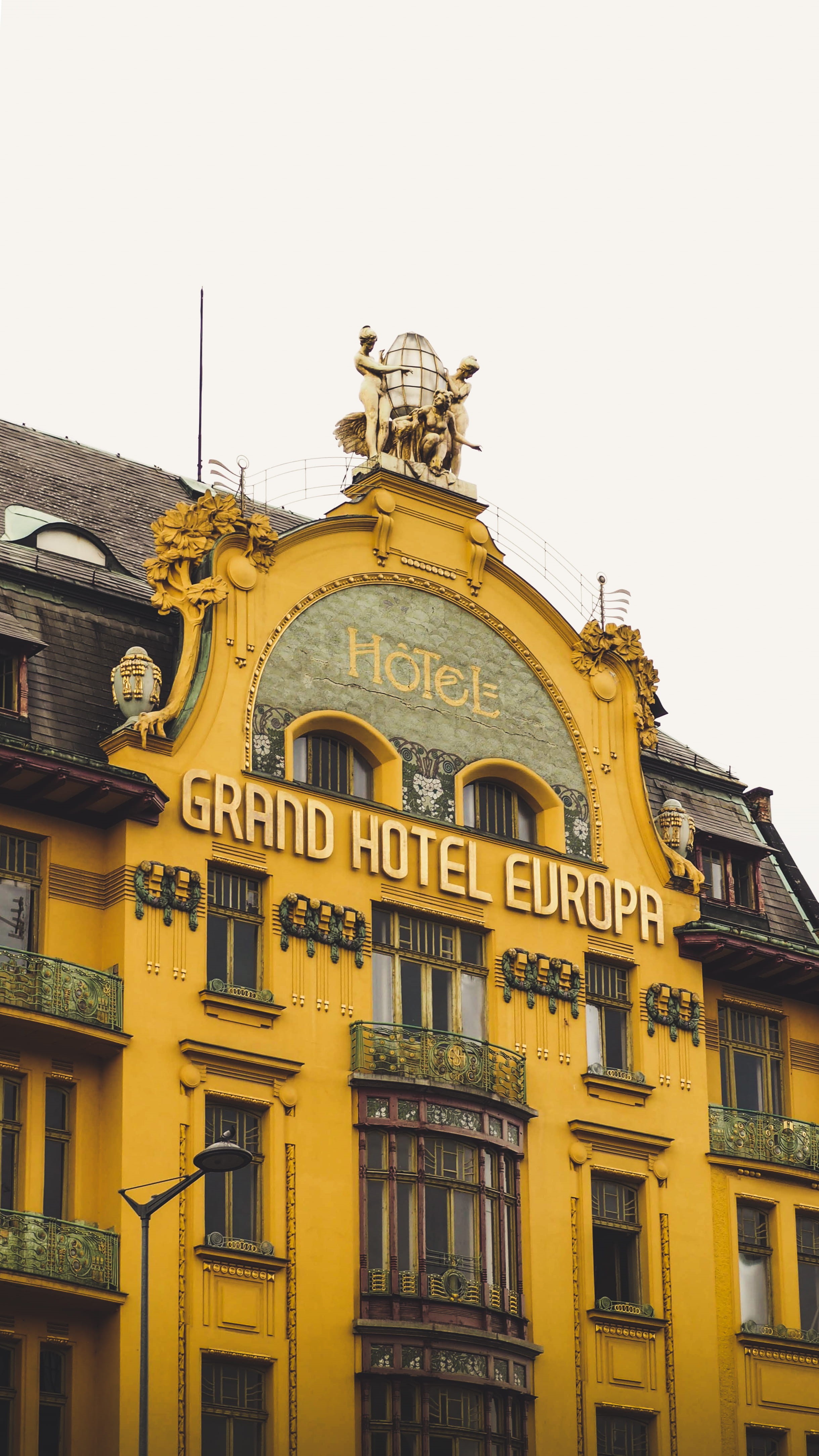 history, communication, brewery, europe, sky, tourism, building, day, tower, 4K, text, clear sky, the past, yellow, old, prague, wes anderson, urban, city, Phone HD Wallpaper