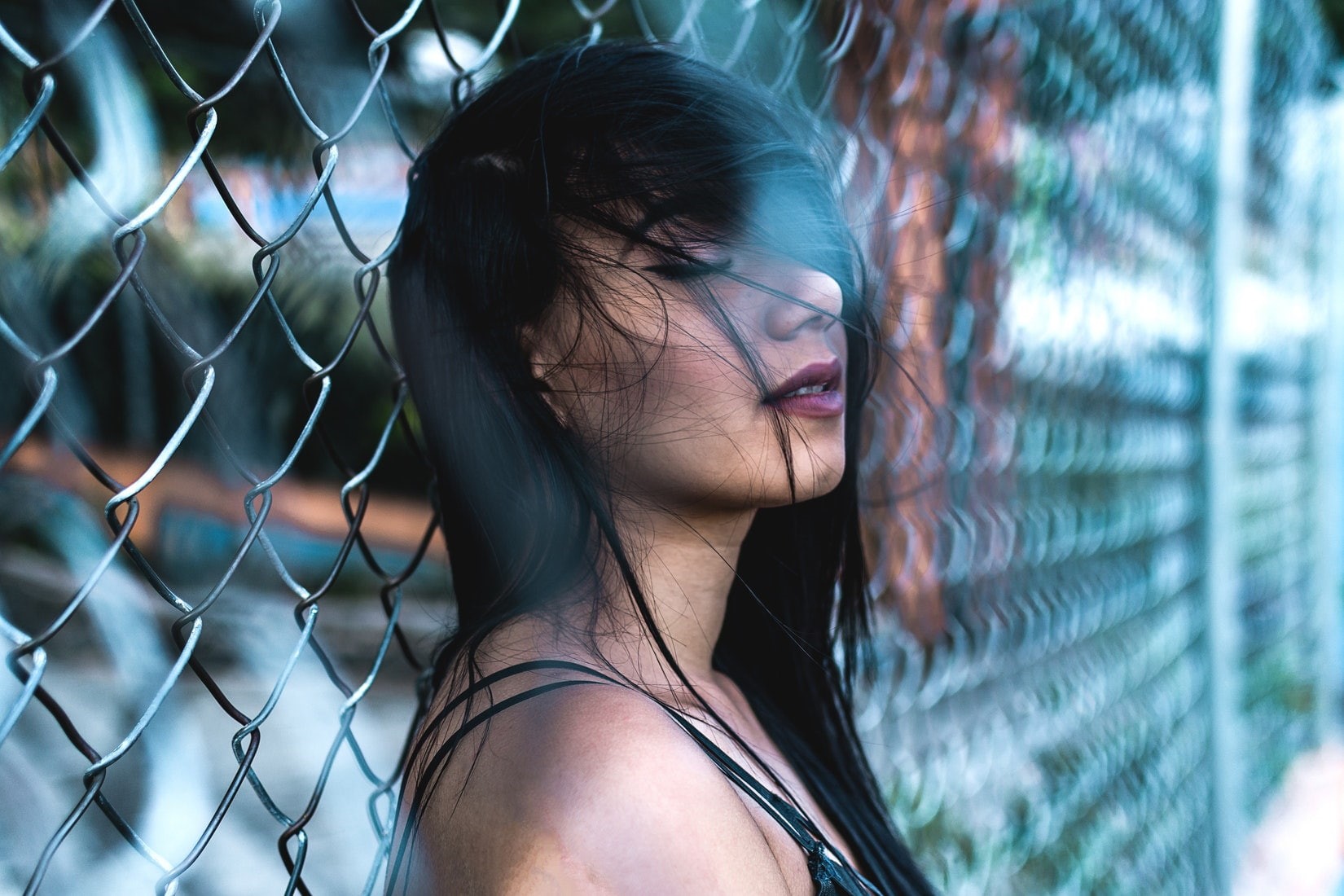 young adult, beautiful woman, boundary, focus on foreground, young women, 720P, leisure activity, beauty, chainlink fence, portrait, closed eyes, lifestyles, HD Wallpaper