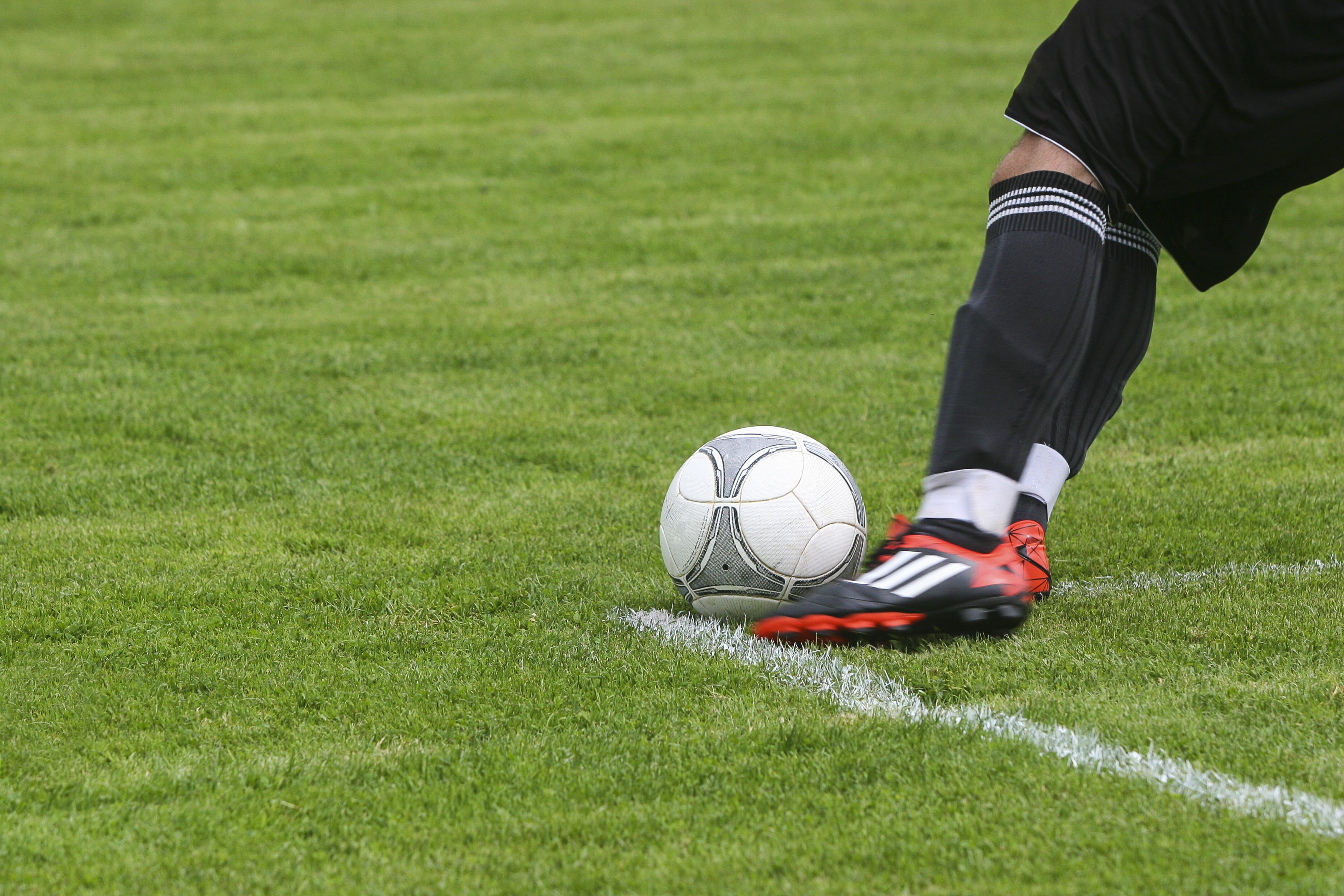 field, games, soccer-field, playing, kick, green color, human leg, sport, competition, hobbies, white, shoes, team sport, one person, soccer player, athlete, HD Wallpaper