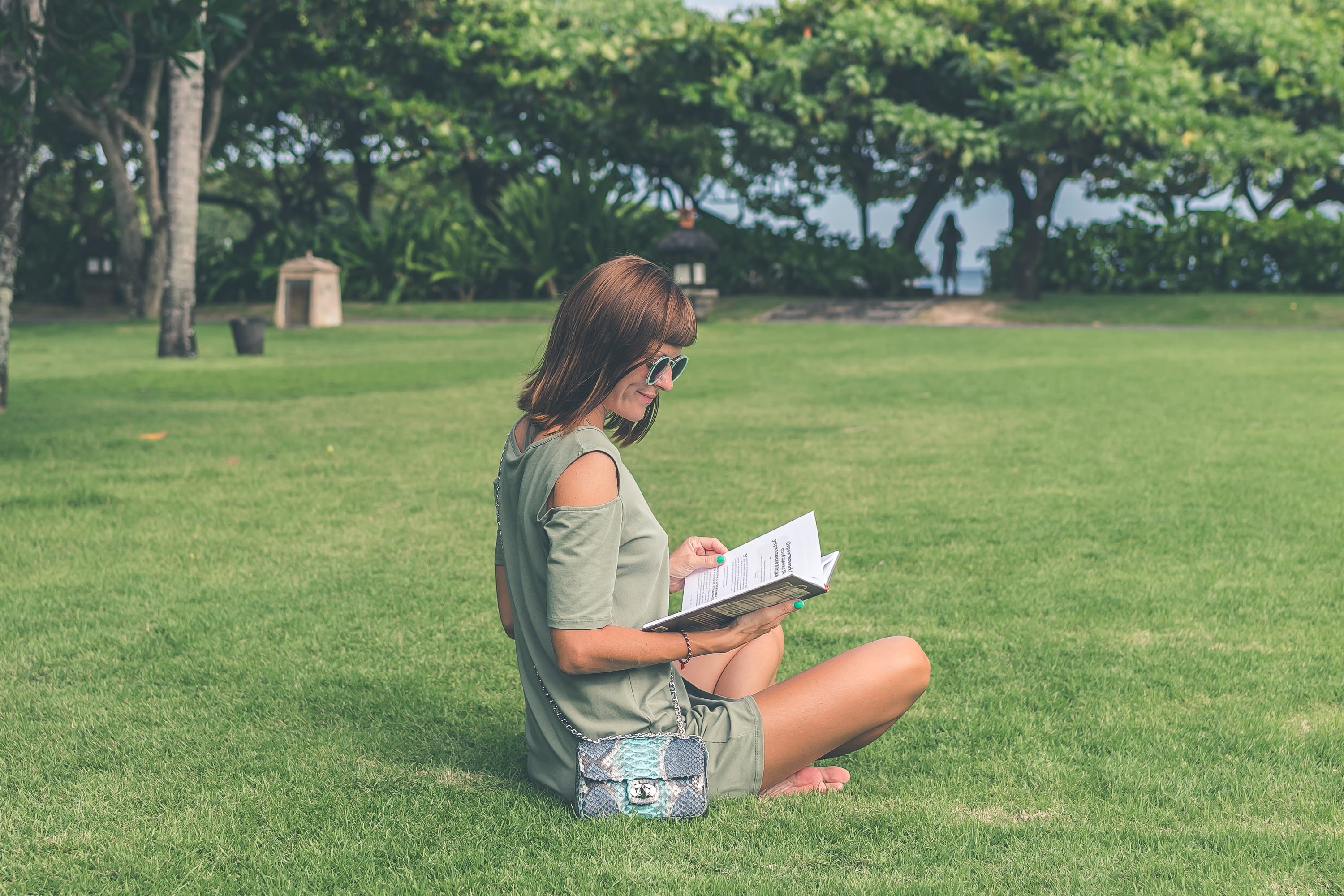grass, student, lifestyles, university, person, study, green color, wearing, education, reading, college, top, literature, outdoors, sitting, one person, HD Wallpaper