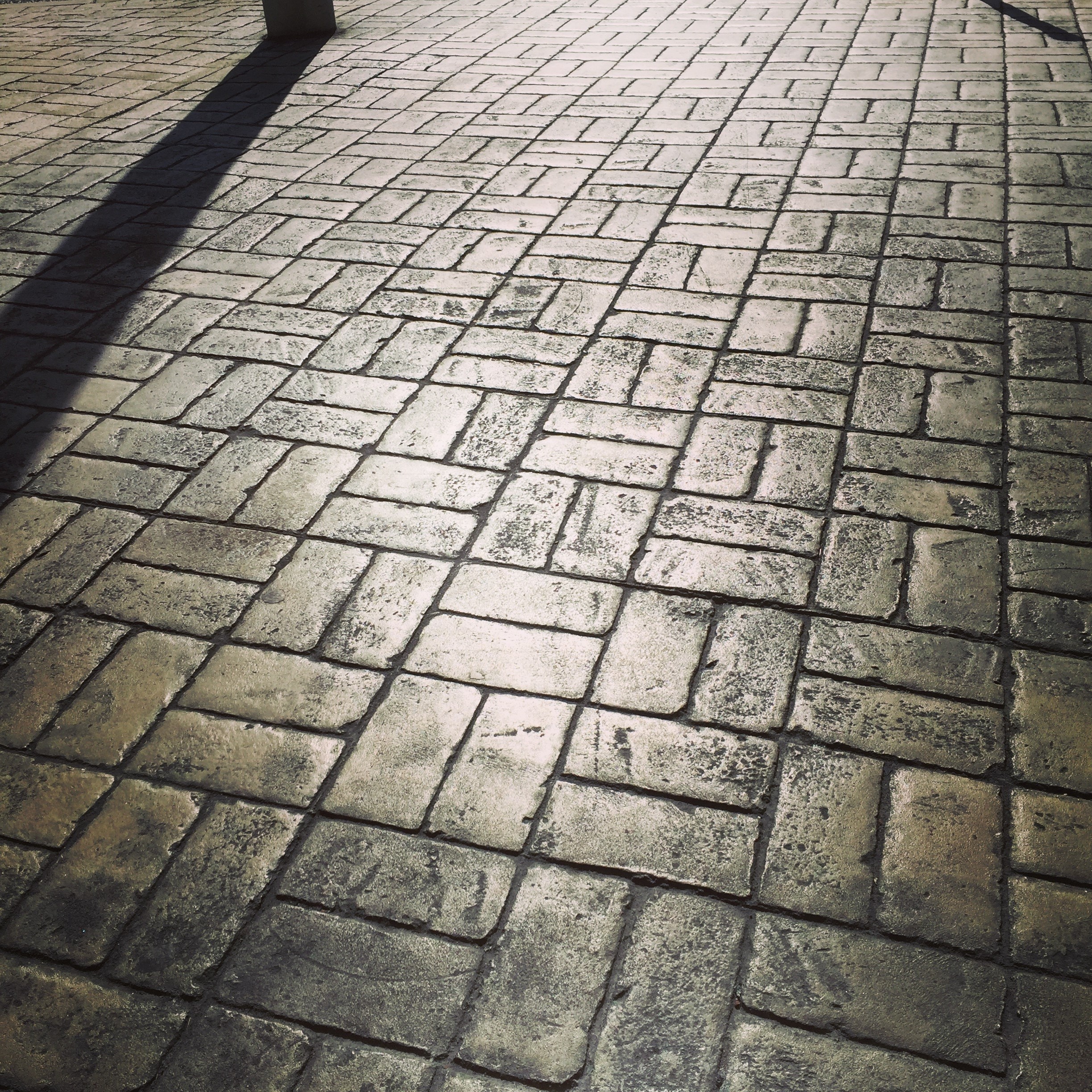 design, pavement, high angle view, cobbled, city, backgrounds, day, sidewalk, sun, footpath, concrete, textured, street, cobblestone, europe, shadows, no people, Phone HD Wallpaper