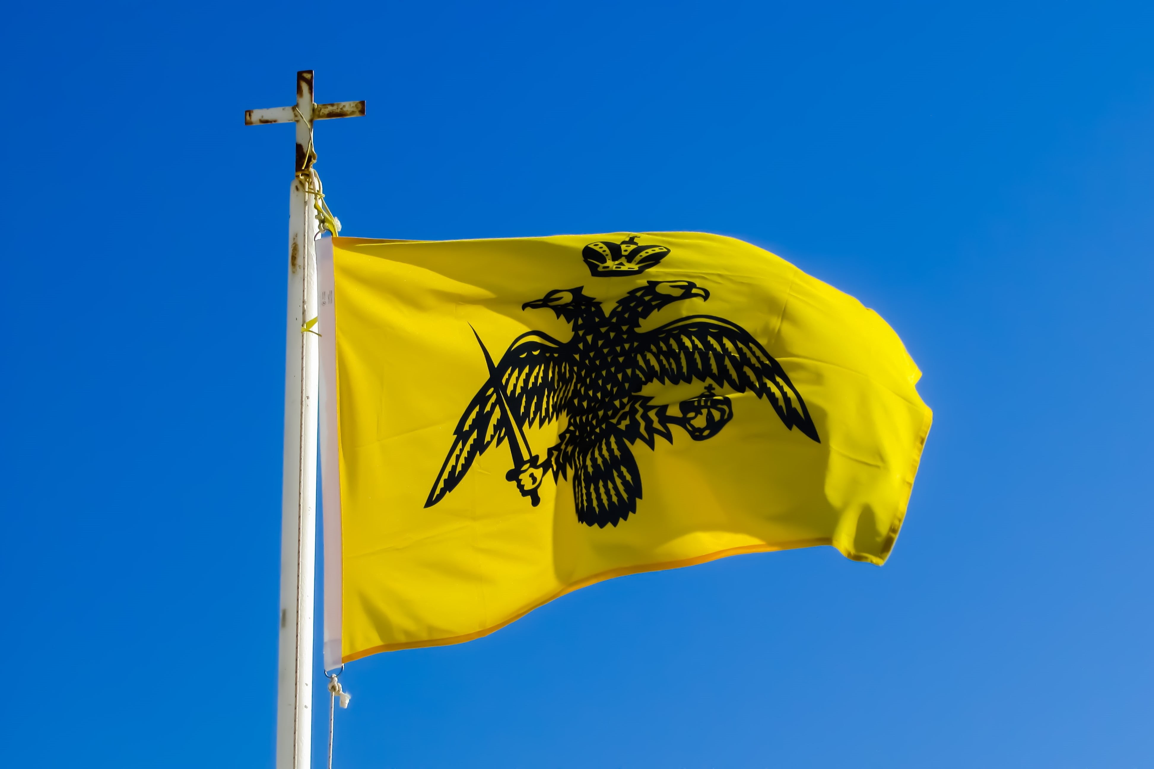 day, sky, patriotism, sunlight, waving, clear sky, emblem, banner, symbol, orthodox, no people, human representation, yellow, christianity, 4K, outdoors, HD Wallpaper