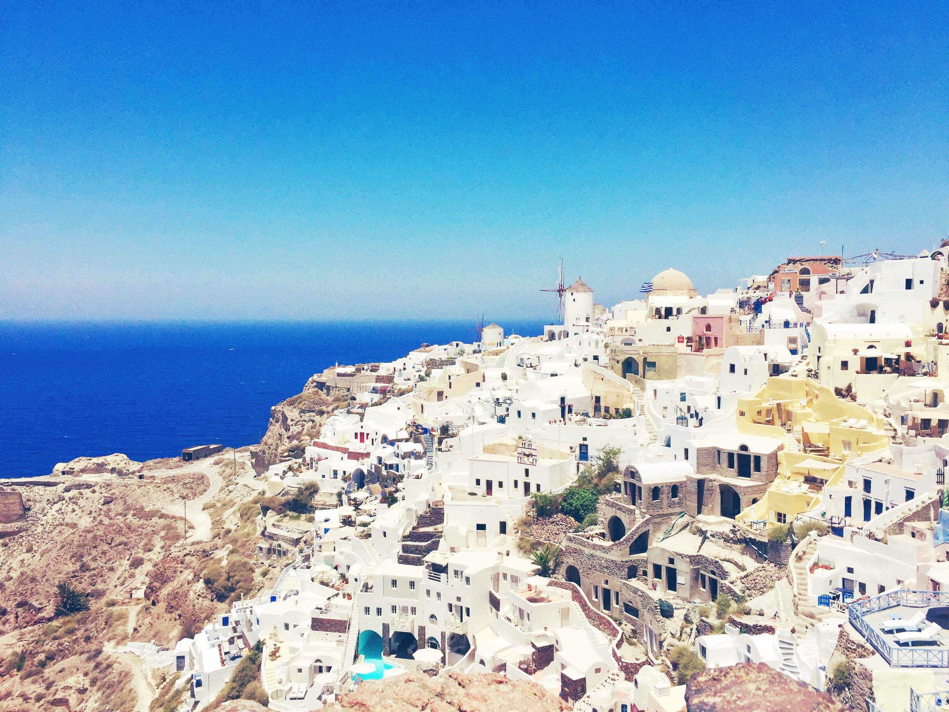 copy space, sky, oium, townscape, torini, greece, village, clear sky, aerial, nature, built structure, crowd, ocean, crowded, horizon over water, view, HD Wallpaper