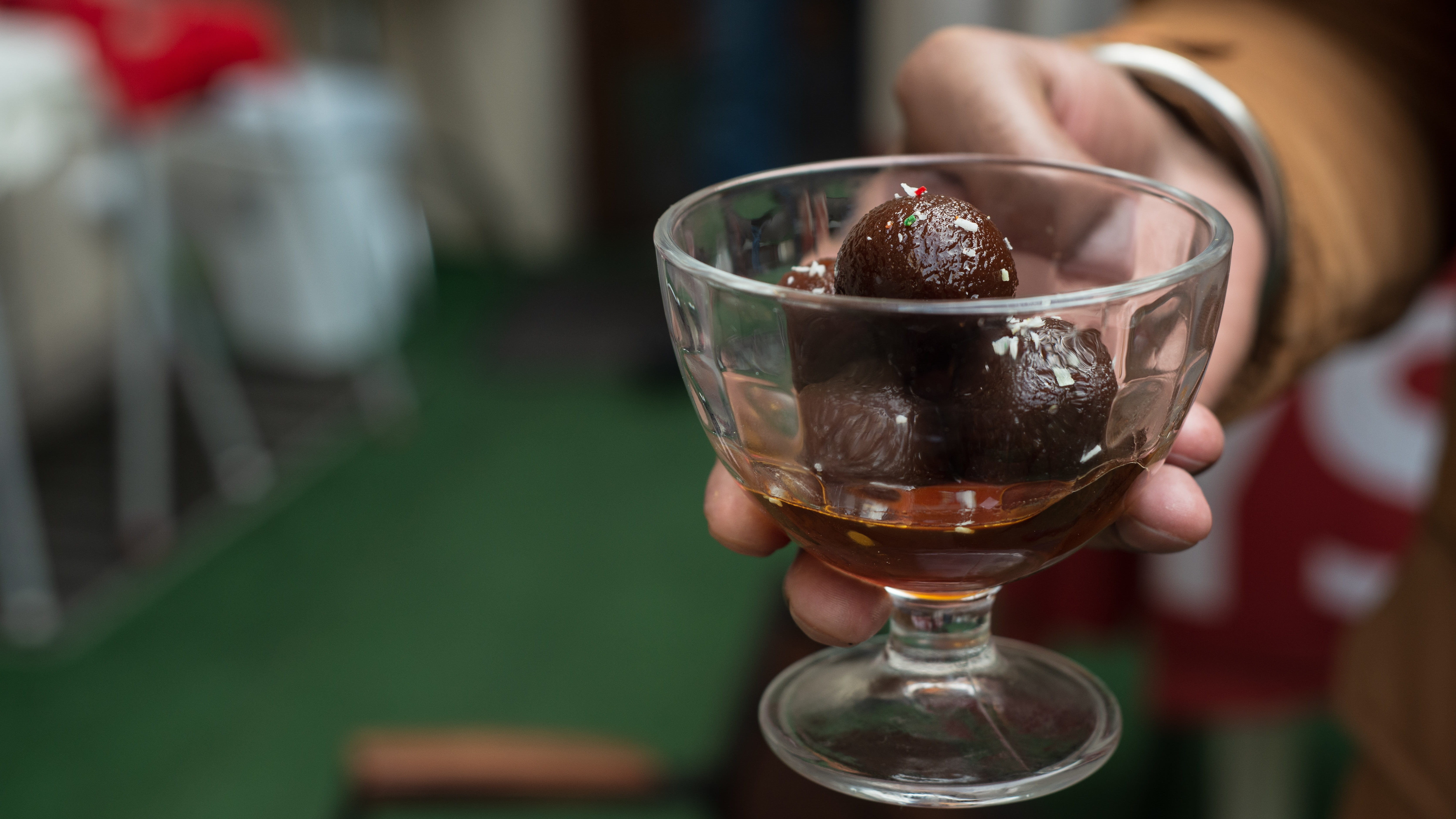 refreshment, glass - material, spice, one person, holding, human body part, gulab jamun, indian food, household equipment, freshness, meal, human hand, HD Wallpaper