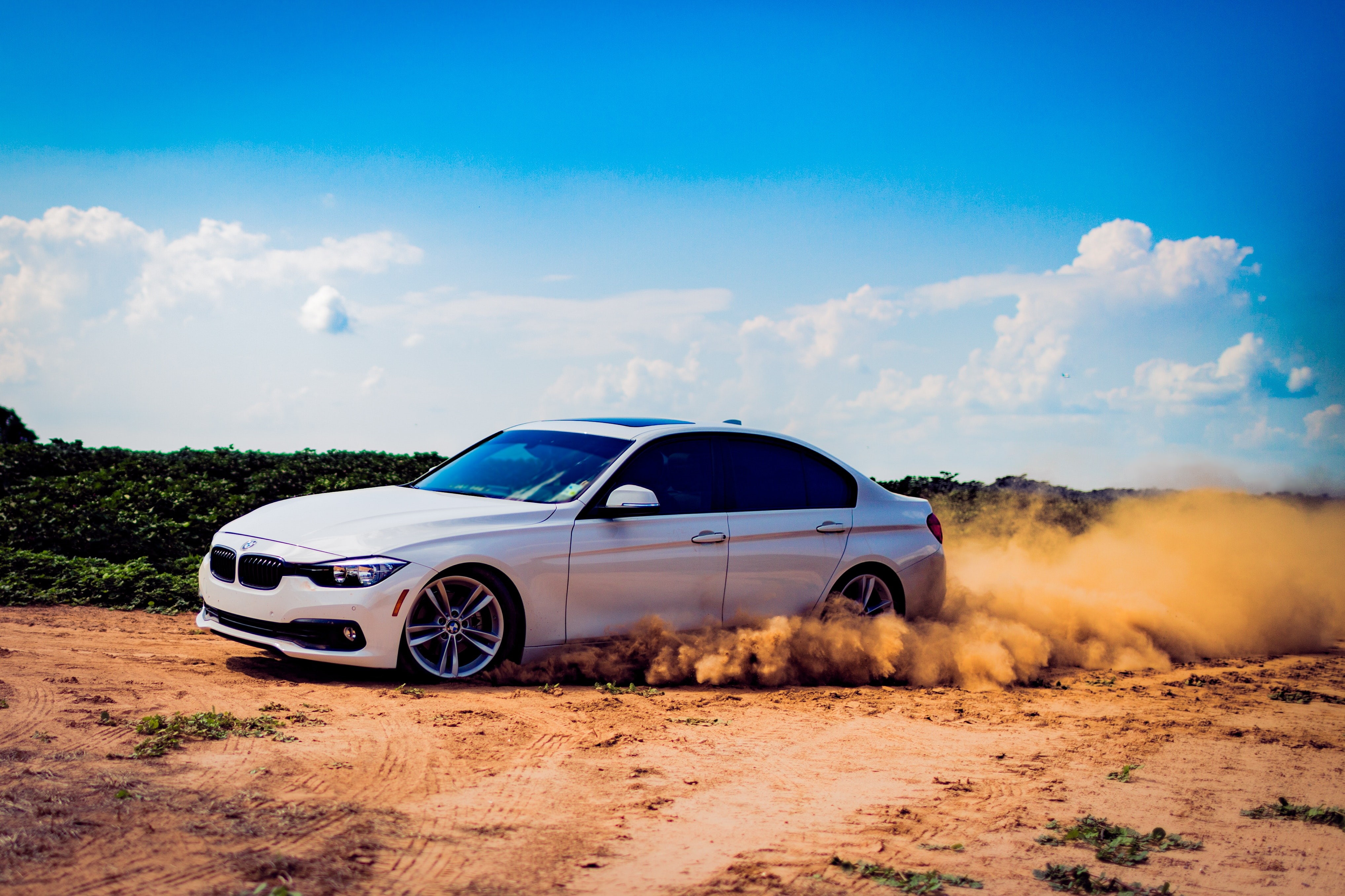 transportation, day, outdoors, travel, field, smoke - physical structure, road, motion, motor vehicle, no people, sky, environment, dust, cloud - sky, mode of transportation, HD Wallpaper
