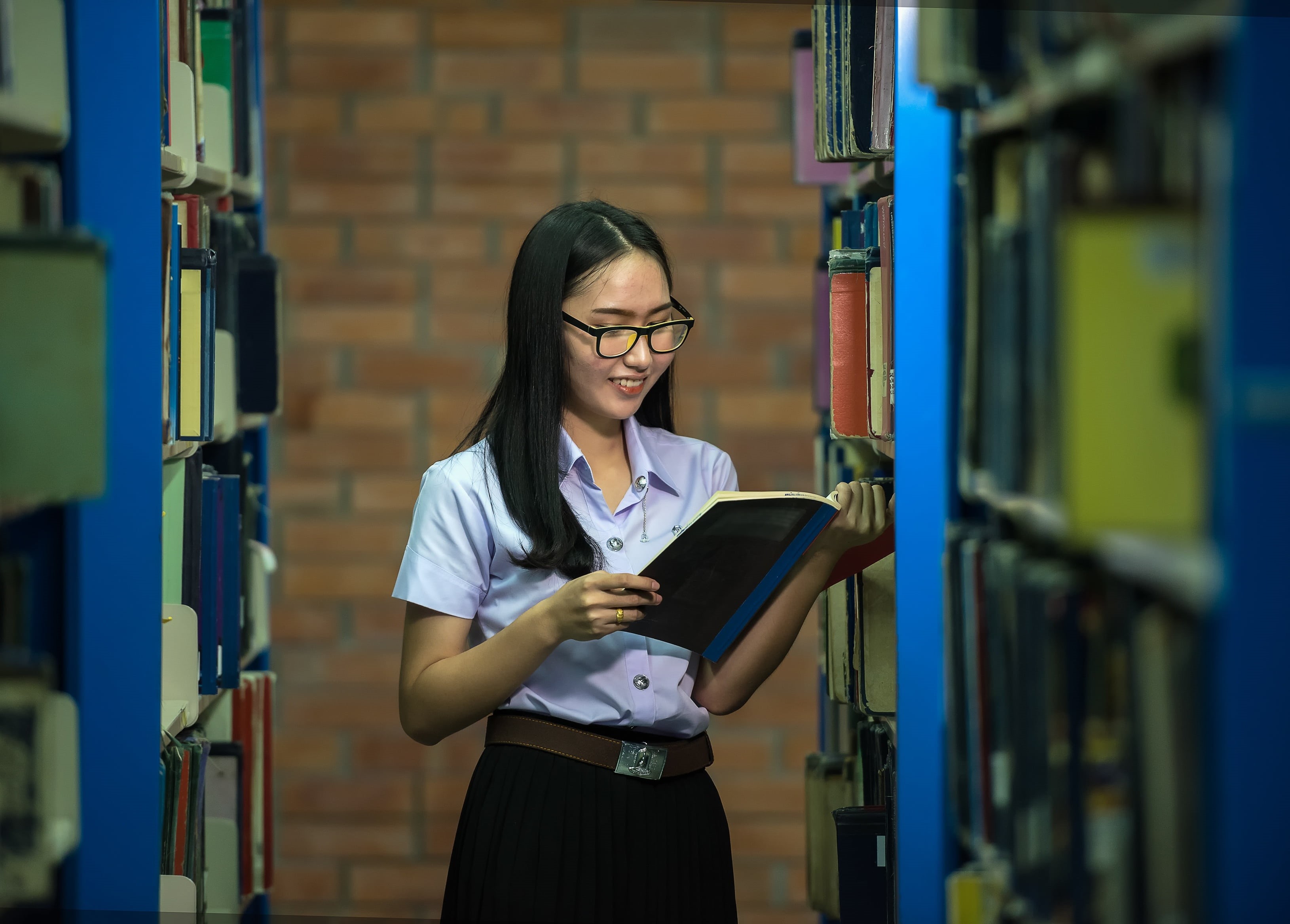 counter, in the house, academic, asia, taller than, business, malaysian, campus, pile, standing, indoors, glasses, college, book shelf, occupation, eyeglasses, HD Wallpaper